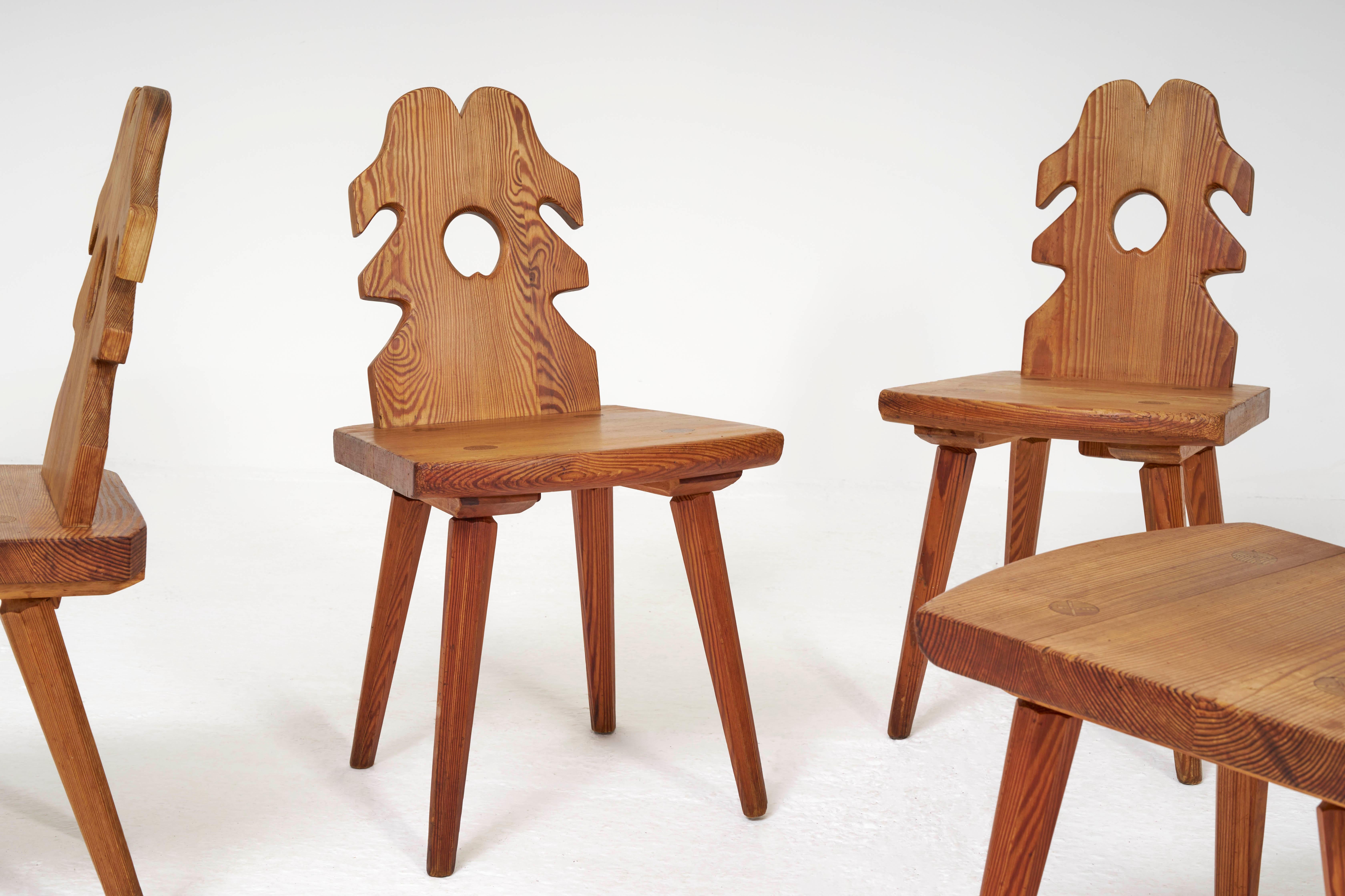 Set of 4 solid pine brutalist chairs. Made in Sweden circa 1960's / 1970's. Crafted from robust pine wood, these chairs are built to withstand daily use and provide long-lasting durability. The condition of each chair is very good with minimal wear