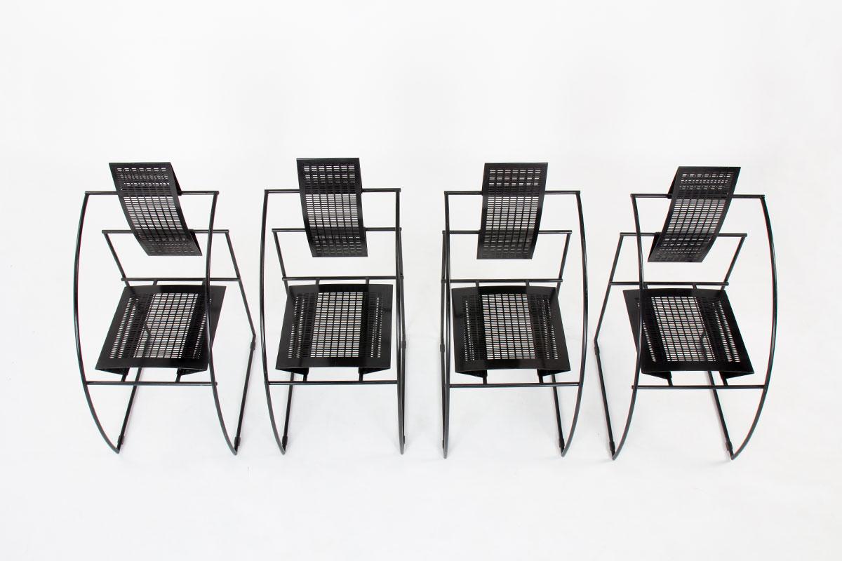 Set of 4 chairs designed by Mario Botta for Alias (stamp on the back of each chairs)
Model Quinta
Structure in black tubular metal 
Seat and back in perforated metal
Famous model