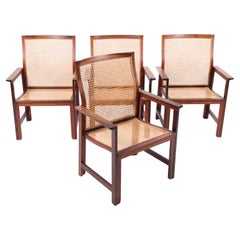 Juego de 4 raros sillones Arne Karlsen de palisandro macizo con caña francesa, años 60