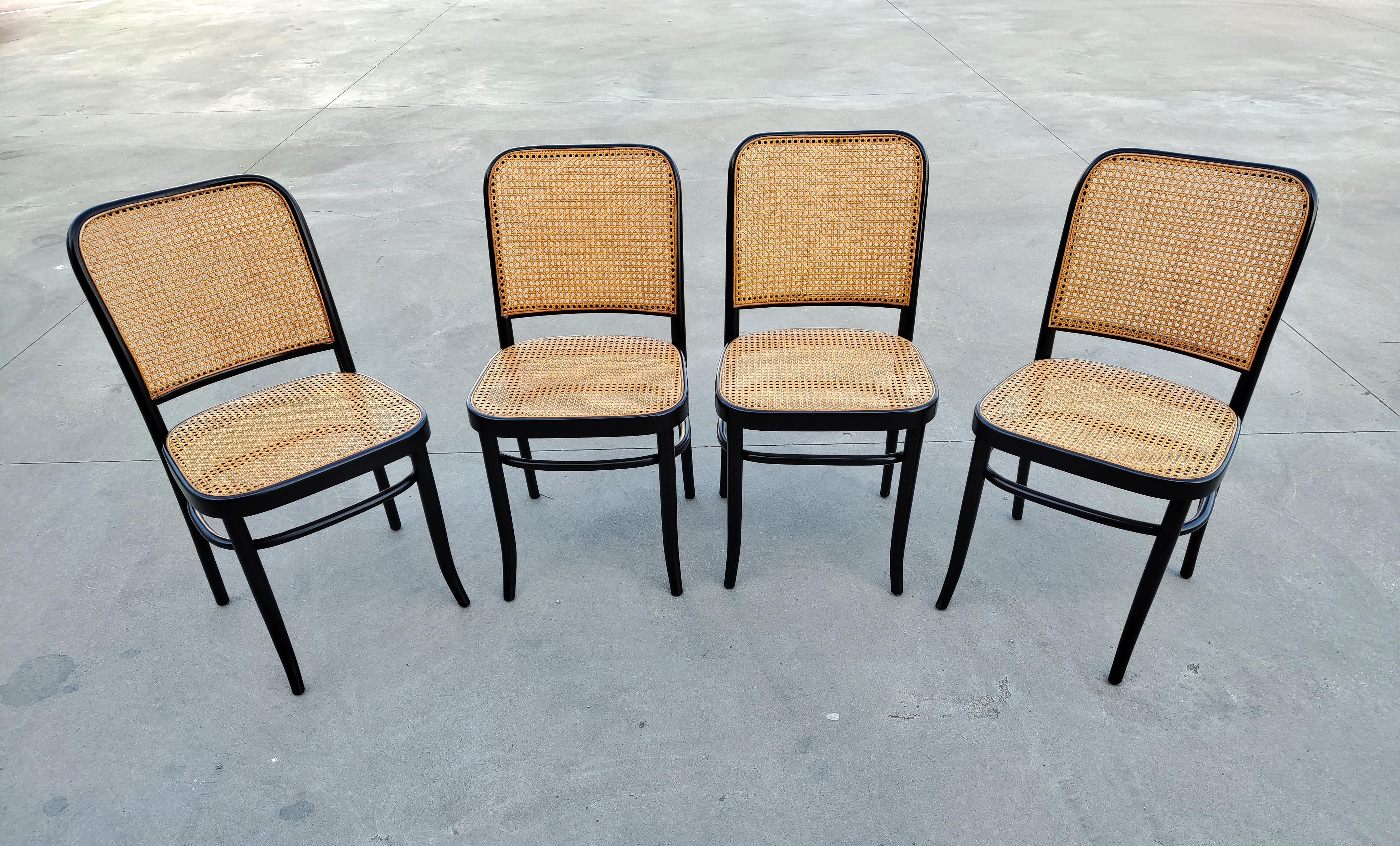 In this listing you will find a set of rare vintage dining chairs designed by Josef Hoffmann for Mundus. The frame of the chairs is done in beech bentwood and painted in black with cane seats and backrest.

Chairs were manufactured by Mundus