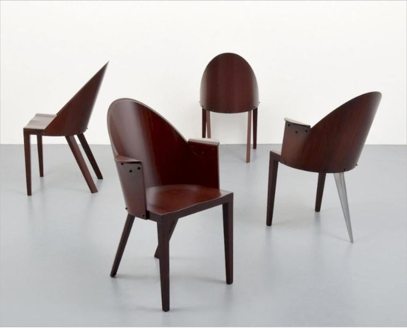 Set of 4 rare 4 Philippe Starck chairs from the Royalton Hotel, NYC.

This set is comprised of two armchairs and two side chairs. One arm chair is the three-legged form.

Original labels.

Royalton Hotel is located just east of Times Square in