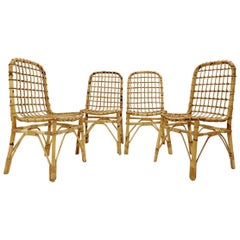 Ensemble de 4 chaises en rotin de style mi-siècle moderne, années 1960