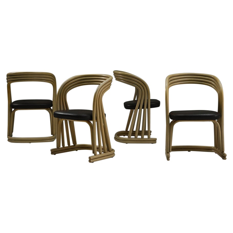 Ensemble de 4 chaises de salle à manger en rotin, années 1980, Italie.