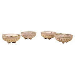 Set of 4 reconstituted stone planters. Circa 1970.