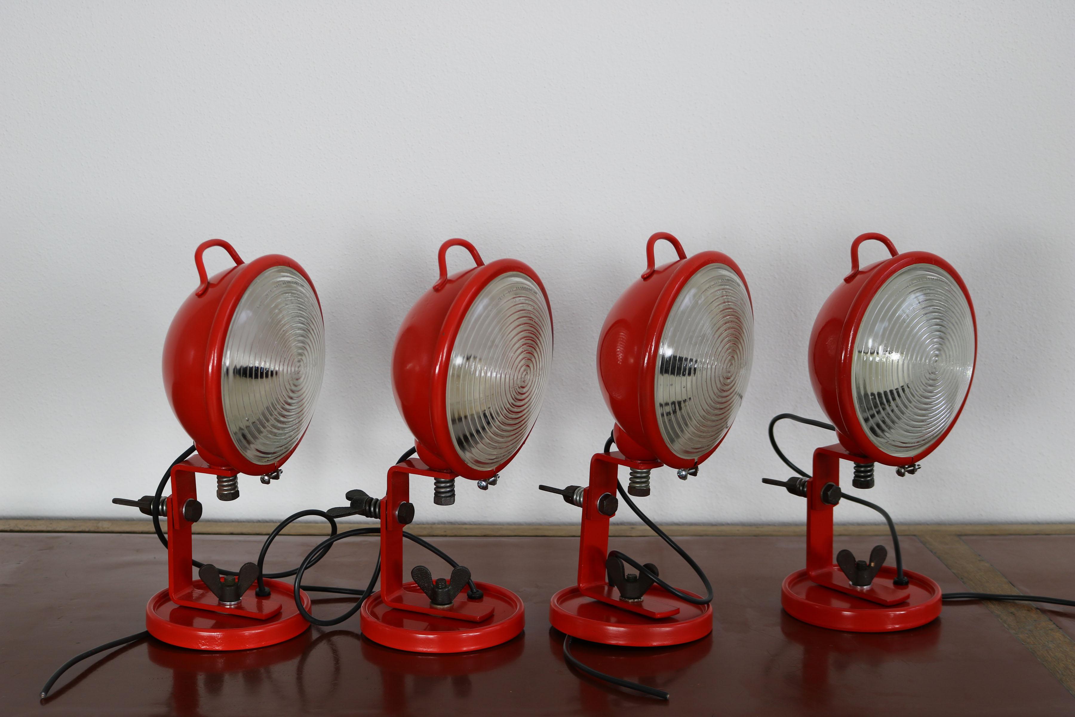 Cesare Leonardi and Franca Stagi for Lumenform, 'Jeep', wall light, red metal, steel, wire, Italy, 1969

This wall light by Leonardi and Stagi has a round red semi-circular shade and round wall fixture. The lamp breathes the credo of form follows