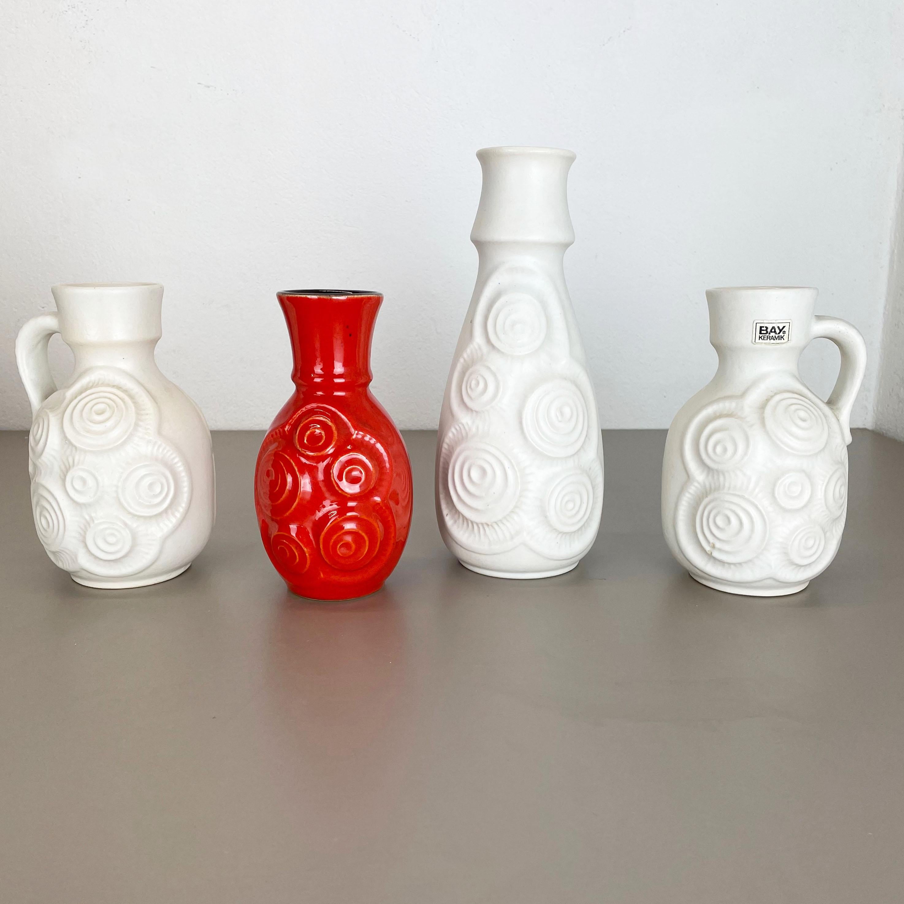 Article:

Pottery ceramic vase set of 2


Producer:

BAY Ceramic, Germany


Decade:

1970s



Description:

Set of 4 original vintage 1960s pottery ceramic vase made in Germany. High quality German production with a nice abstract