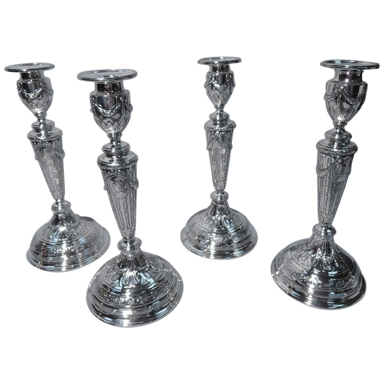 Set of 4 Rococo German Silver Candlesticks with Medallion Profile