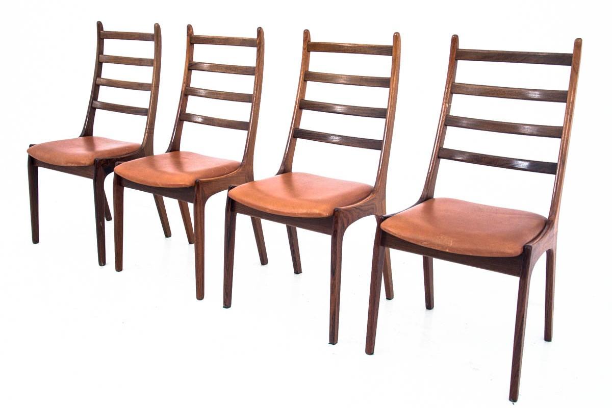 A set of 4 chairs, Danish design, 1960s
Made of rosewood. 
Very good condition, after professional renovation. 
Original upholstery preserved in excellent condition. 
   