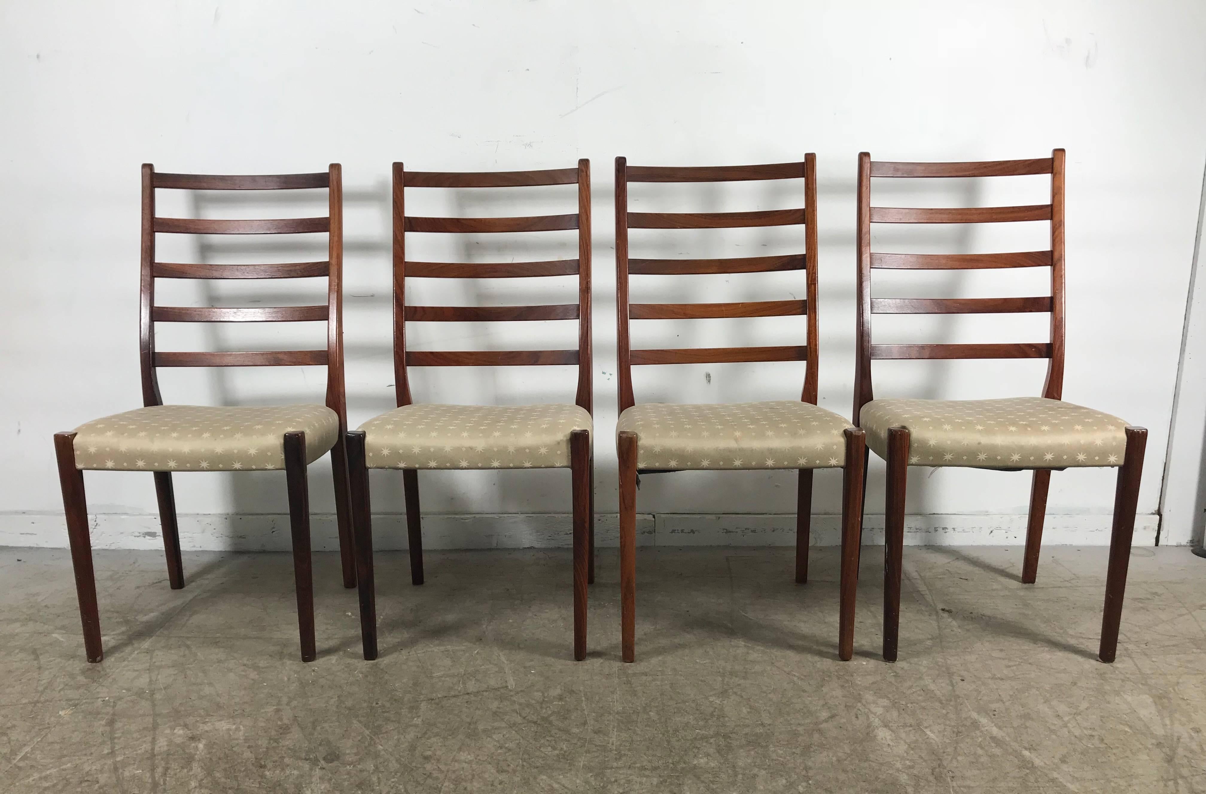A handsome set of four rosewood ladder back dining chairs by Svegards Markaryd 

Chairs are burnt marked Svegards Markaryd made in Sweden.
  