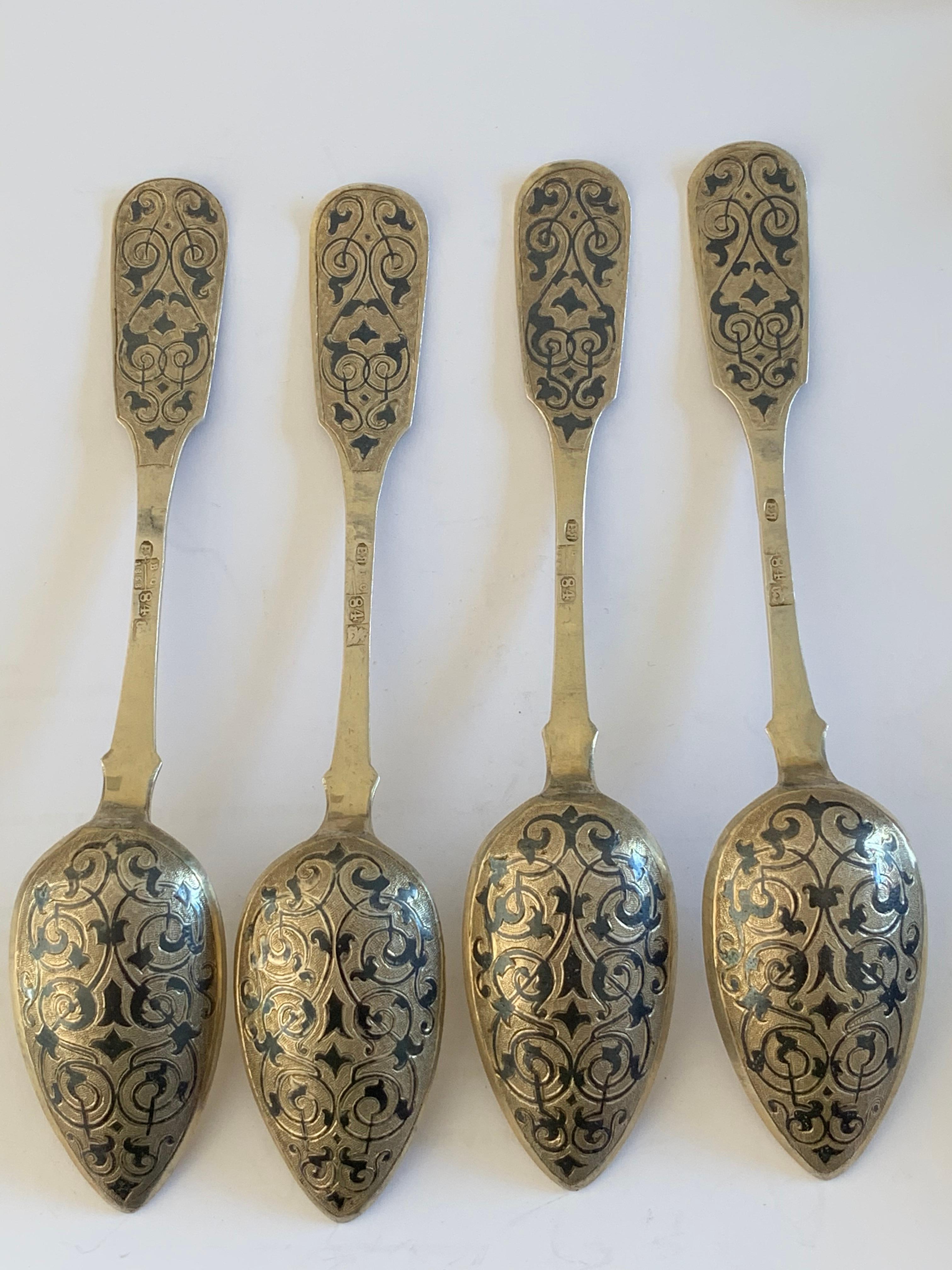 Great set of 4 Russian silver and Niello spoons dated 1858, the bowls are gilded.
 
   