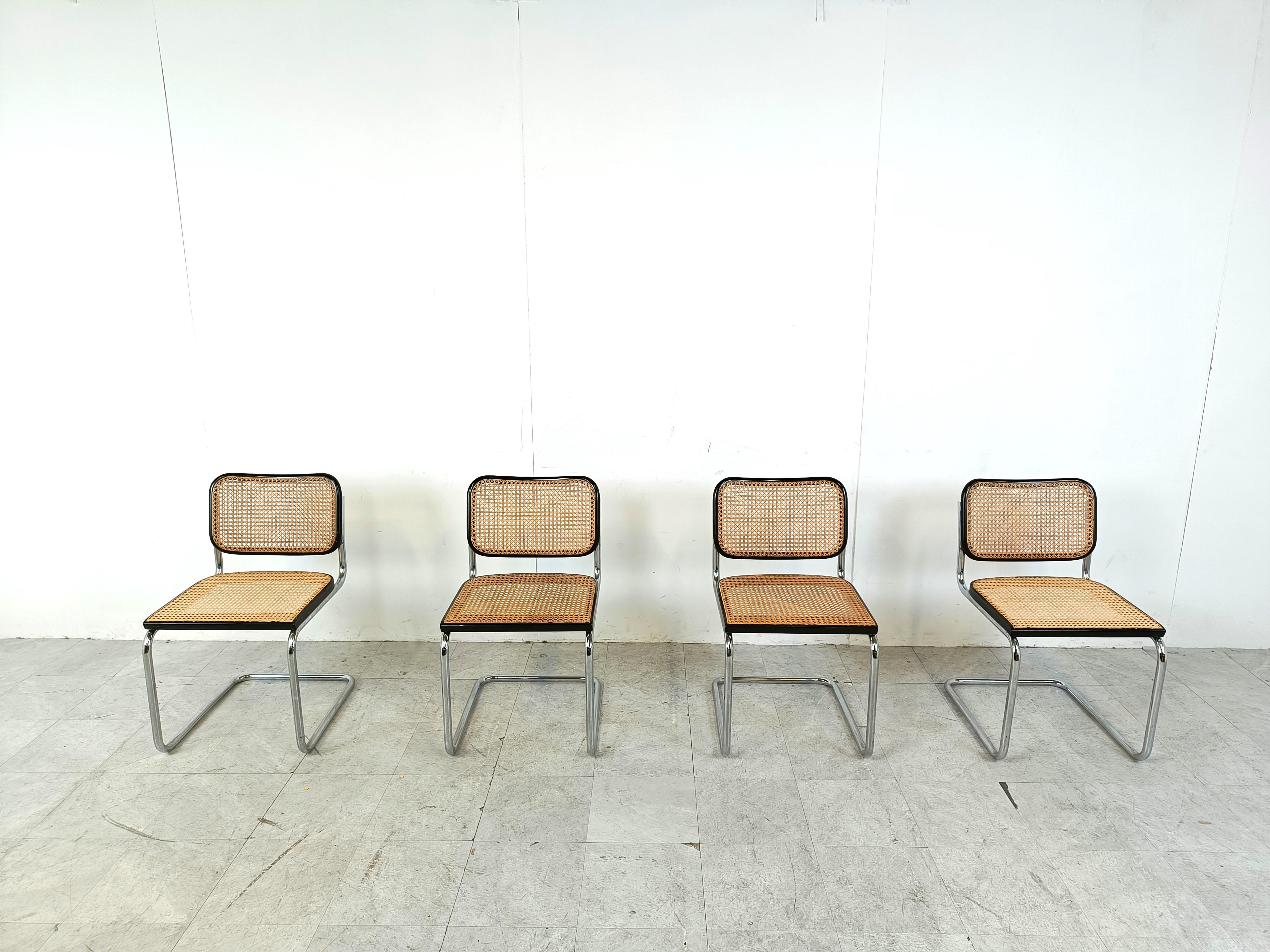 Set of 4 'cesca'  S32 bauhaus design chairs. Original design dates from 1926 by Marcel breuer.

These where produced and labelled by Gavina in the 1970s

Tubular chrome frame, cane seats and black lacquered wood.

Good condition with normal age
