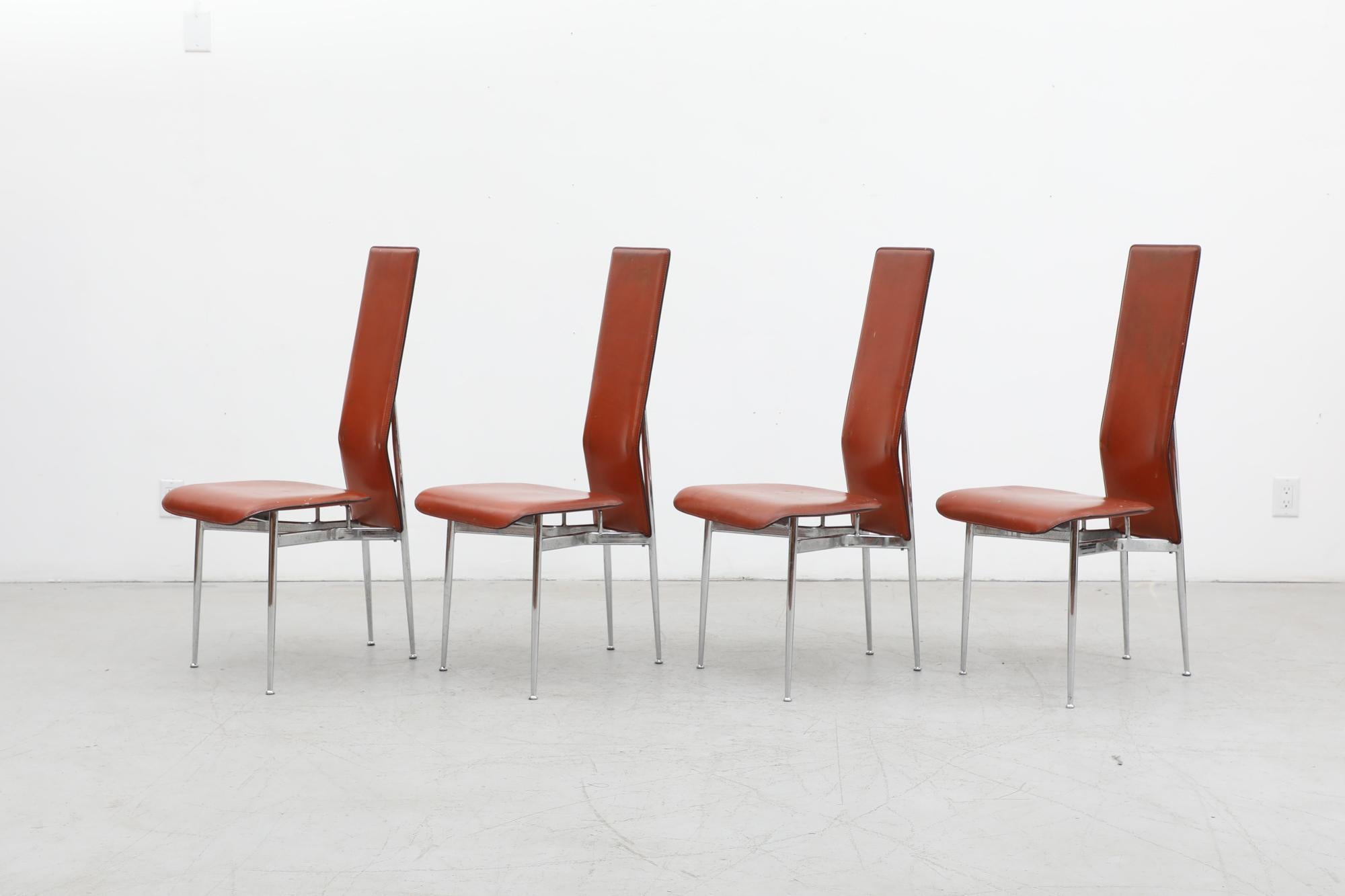 Set of 4 'S44' Chairs by Giancarlo Vegni & Gianfranco Gualtierotti for Fasem, 1980's. These chairs have cognac leather seats with chrome frames and are in original condition with visible wear. Some pitting and discoloration to the chrome and patina