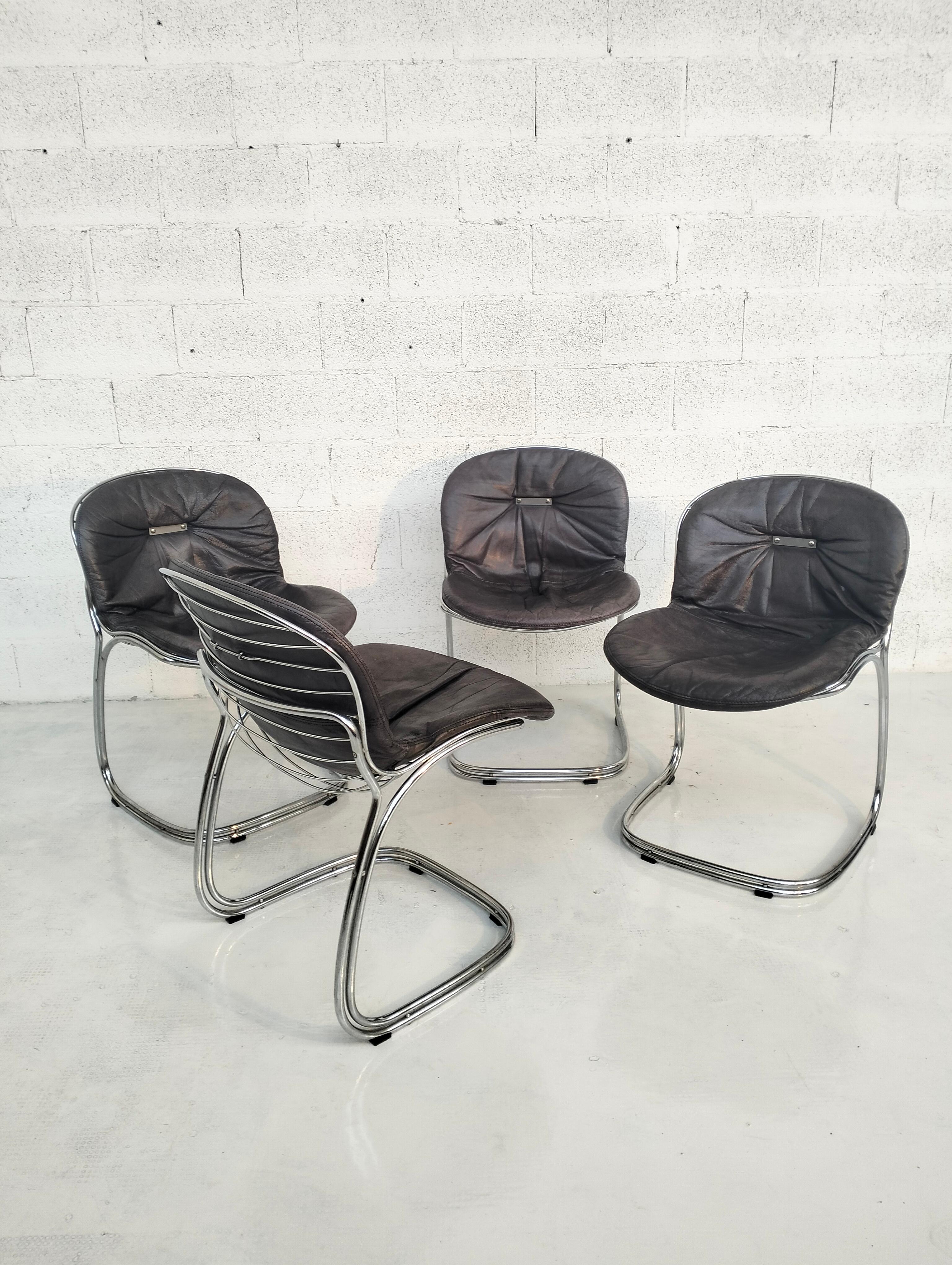 Sabrina chair designed by Gastone Rinaldi for Rima in the 70s. Characterized by the chromed steel tubular structure and the cushions covered in brown imitation leather.

Gastone Rinaldi was born in Padua in 1920. He initially worked for the Rima