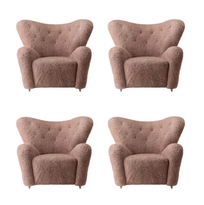 Set of 4 Sahara Sheepskin the tired man lounge chair by Lassen
Dimensions: W 102 x D 87 x H 88 cm 
Materials: Sheepskin

Flemming Lassen designed the overstuffed easy chair, The Tired Man, for The Copenhagen Cabinetmakers’ Guild Competition in