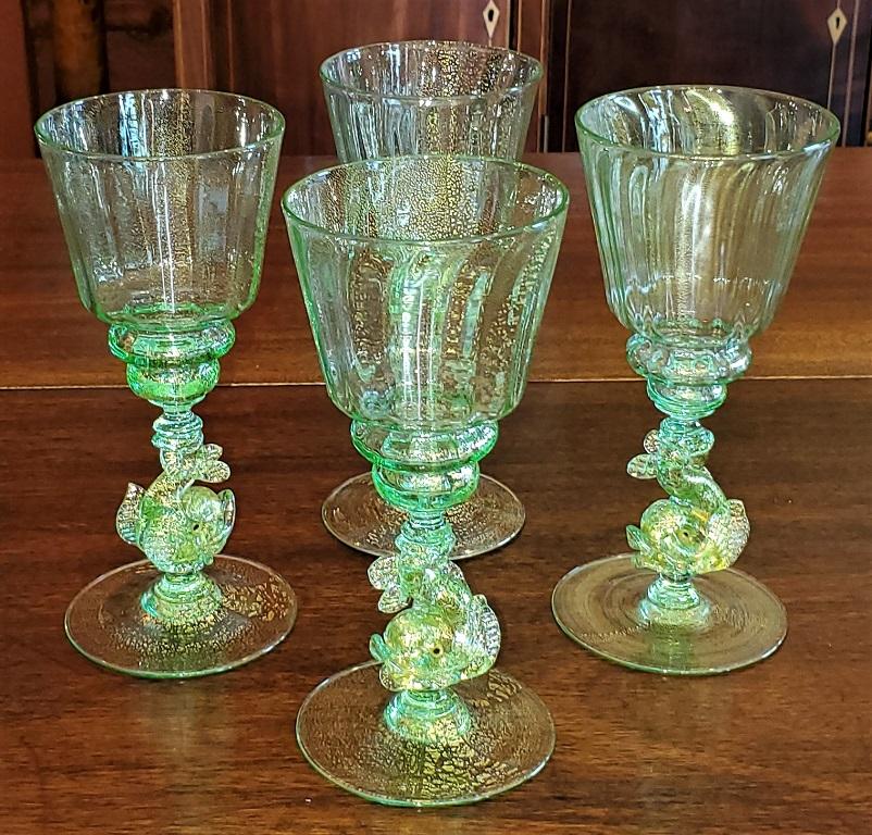 Presenting a gorgeous Set of 4 Salviati Venetian glass medium wine goblets.

Made in Venice, Italy circa 1960 by the world famous Salviati Glassworks.

In near mint condition with no chips or cracks.

Each consists of a clear glass base with