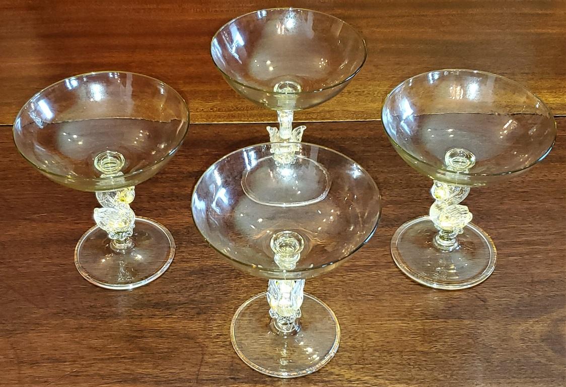 Presenting a gorgeous set of 4 Salviati venetian swan flat champagne flutes.

Made in Venice, Italy circa 1930 by the World famous Salviati Glassworks. Art Deco glasses.

In near mint condition with no chips or cracks.

Each consists of a