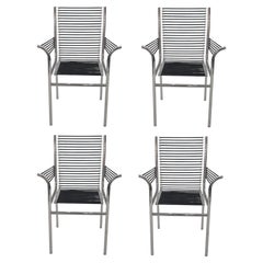 Ensemble de 4 chaises Sandows noires, René Herbst, 1929
