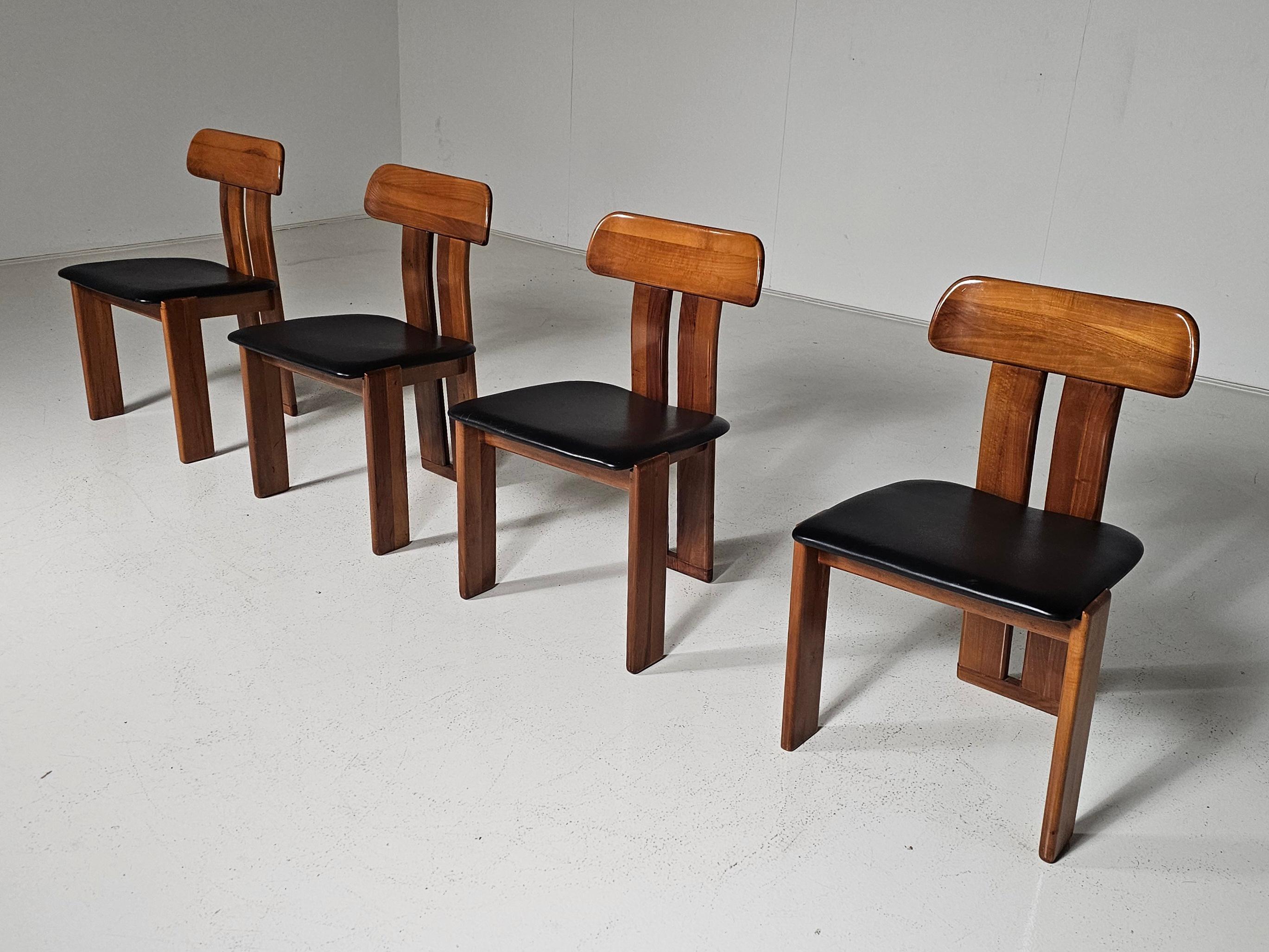 'Sapporo' dining chairs, designed by Mario Marenco for Mobil Girgi, Italy, circa 1970. 

These chairs are made from Italian walnut with a stunning grain pattern. The chairs are a timeless classic, crafted with an individual backrest and two vertical