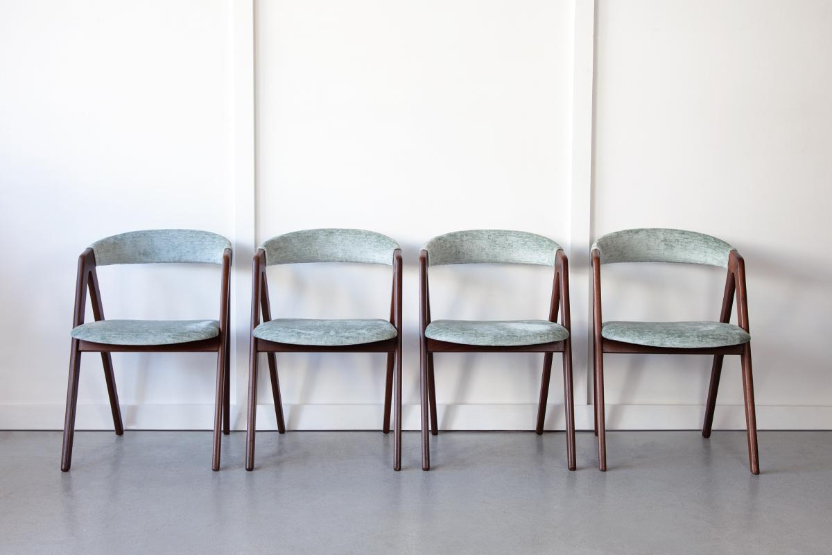 A set of four Danish dining chairs produced by Sax Møbler with wonderfully expressive forms, minimalist lines and enveloping back rests. The seats and back rests have been newly upholstered in a beautifully mellow duck egg blue textured velvet. 