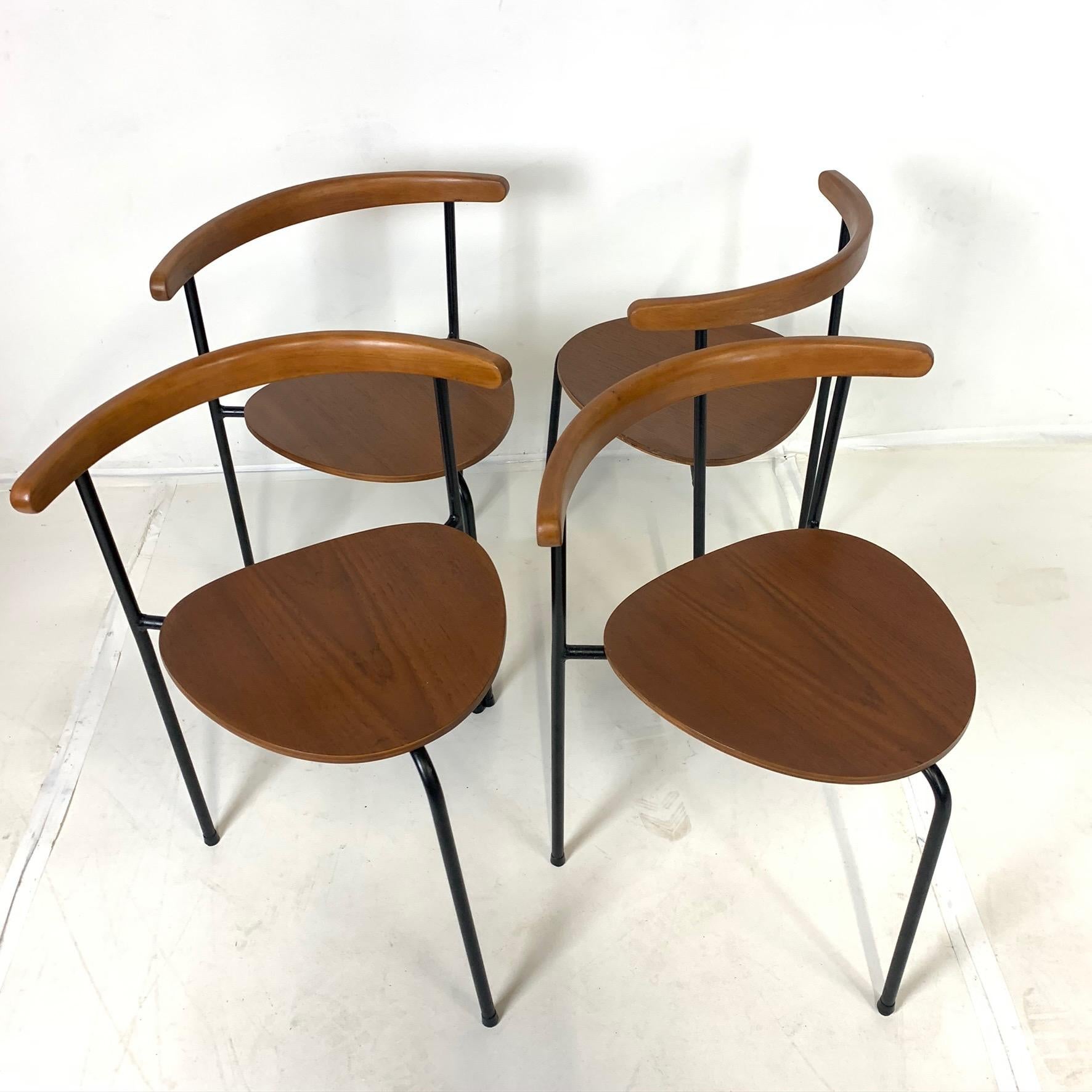 Set of 4 Scandinavian Stacking 3- Legged Teak, Beech, and Metal Dining Chairs In Good Condition In Hudson, NY
