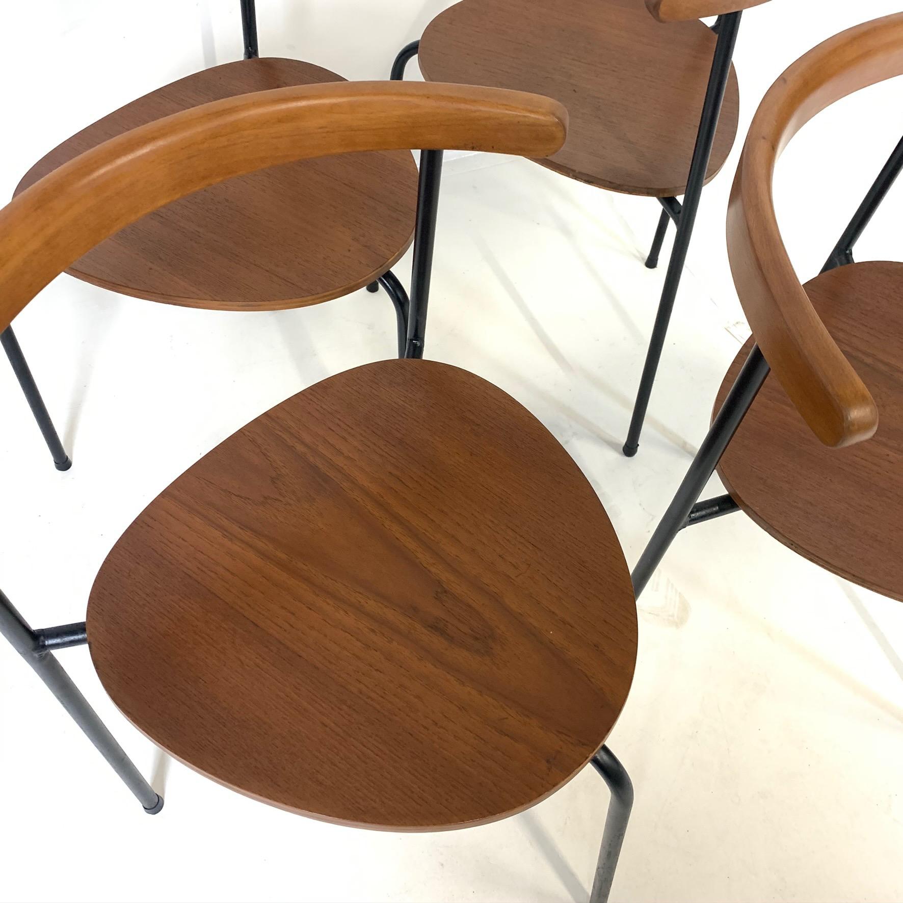 Mid-20th Century Set of 4 Scandinavian Stacking 3- Legged Teak, Beech, and Metal Dining Chairs