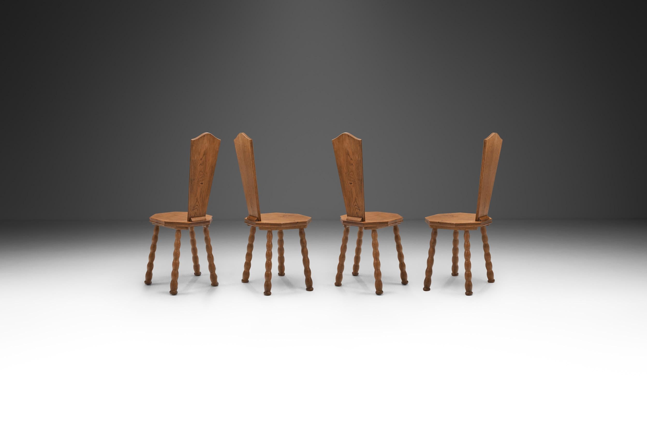 European Set of 4 Sculptural Patinated Oak Spinning Chairs, Europe ca early 20th century For Sale