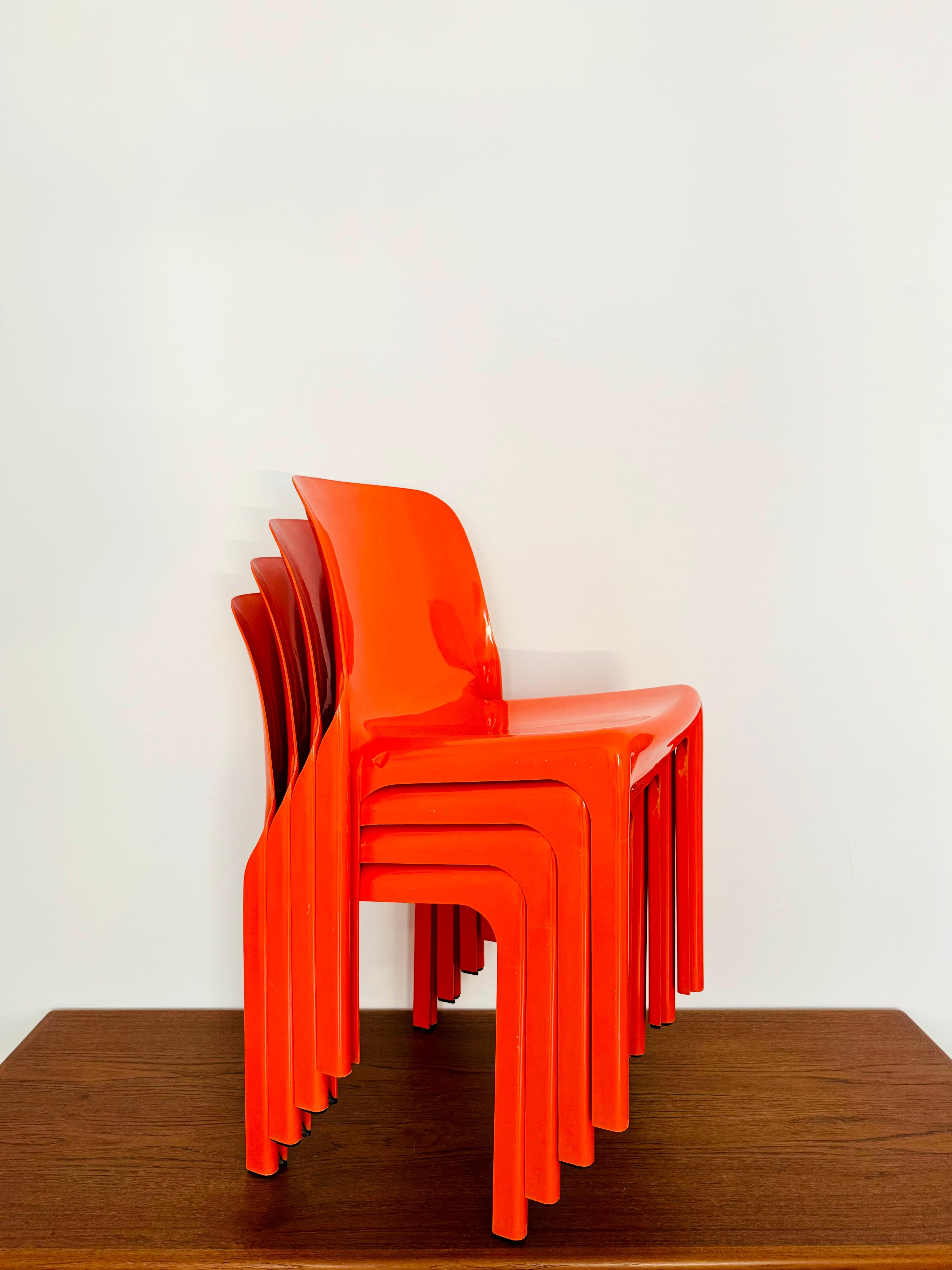 Stunning Italian plastic chairs from the 1970s.
Extremely successful design and an enrichment for every home.
The chairs are both comfortable and stackable to save space.

Design: Vico Magistretti
Manufacturer: Artemide Milano
Model: