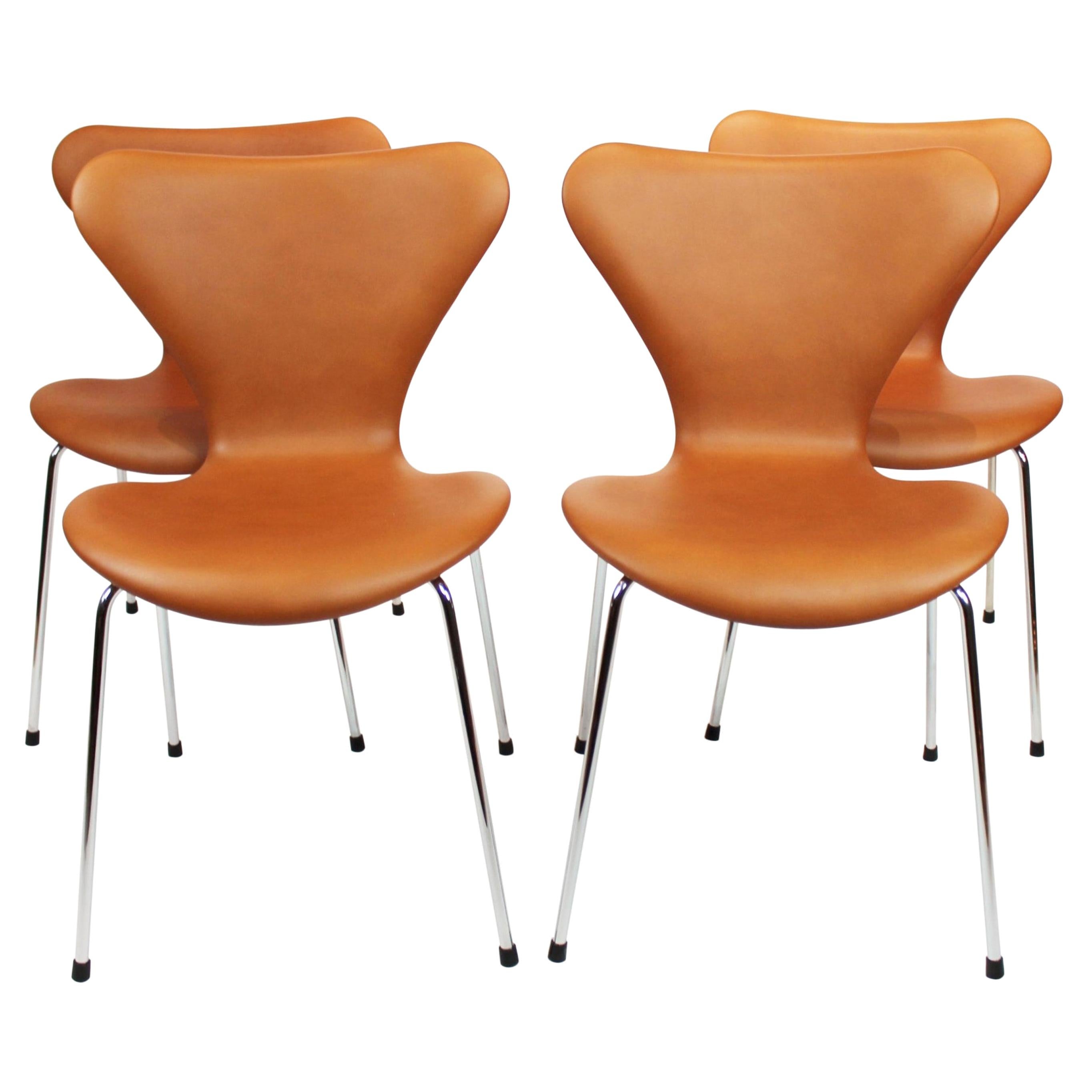 Set of four Series Seven Chairs, Model 3107, cognac leather, Arne Jacobsen