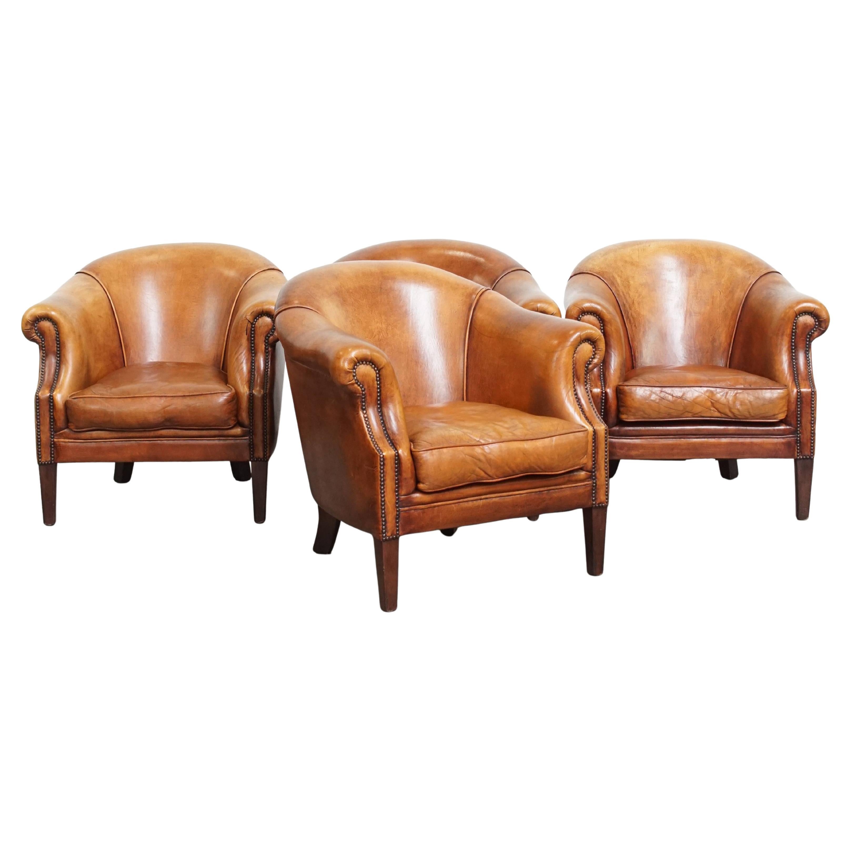 Juego de 4 sillones Club de piel de oveja en venta