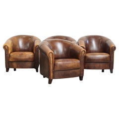 Ensemble de 4 fauteuils club en cuir de mouton