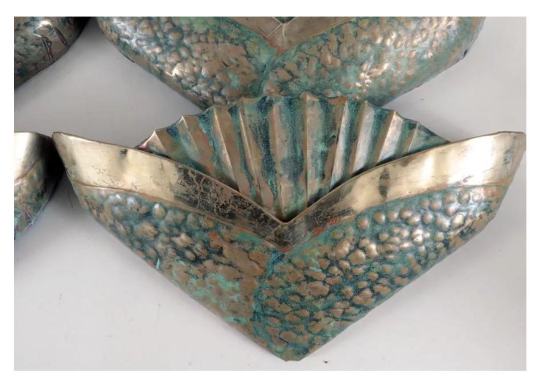 A set of four vintage shell form turquoise and brass wall sconces. Come unelectrified and have distressed verdigris patina. 

Dimensions:
H: 12