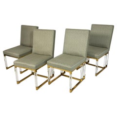 Conjunto de 4 sillas de comedor de lucita y latón firmadas por Charles Hollis Jones, Línea Métrica