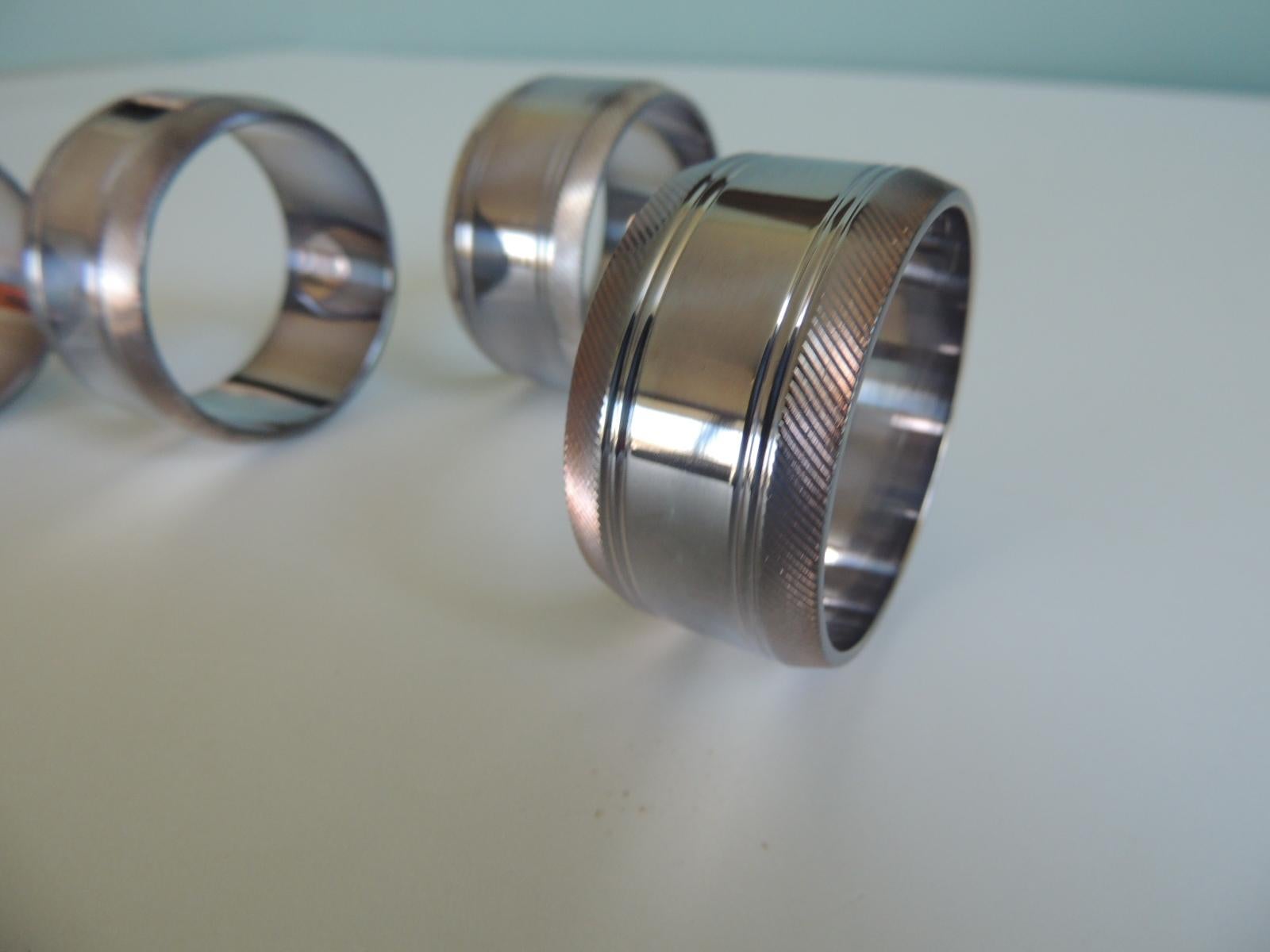 Mid-Century Modern Set of (4) Silver Plated Round Napkin Ring Holders