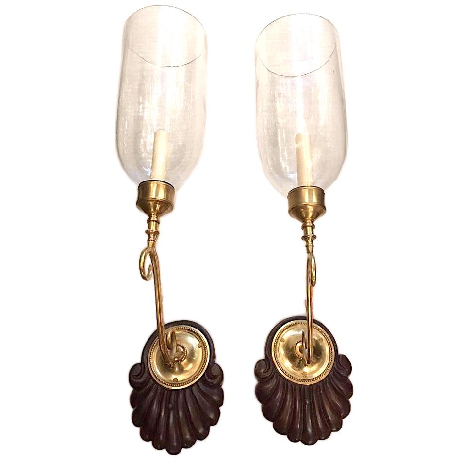 Set of four circa 1950's Anglo-Indian sconces with clear globes, single lights. Sold per pair.

Measurements:
Height: 24