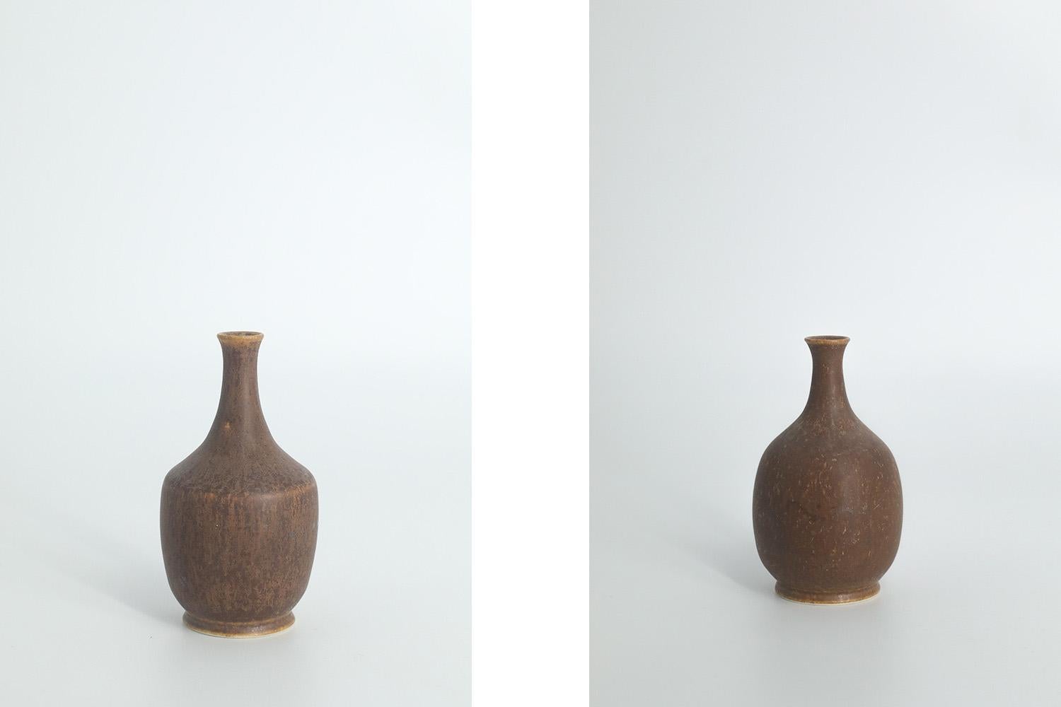 1. Height 8 cm | Width 5 cm | Depth 5 cm
2. Height 8 cm | Width 4.5 cm | Depth 4.5 cm
3. Height 6 cm | Width 3 cm | Depth 3 cm
4. Height 5 cm | Width 2.5 cm | Depth 2.5 cm

This set of 4 miniature vases was designed by Gunnar Borg for the Swedish