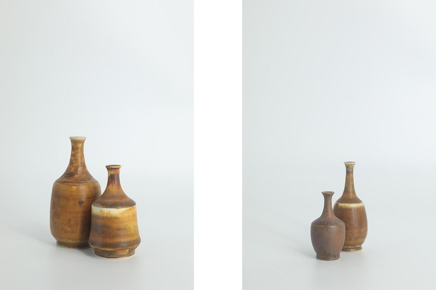 1. Height 10 cm | Width 4.5 cm | Depth 4.5 cm
2. Height 8 cm | Width 4.5 cm | Depth 4.5 cm
3. Height 6 cm | Width 2.5 cm | Depth 2.5 cm
4. Height 4.5 cm | Width 2 cm | Depth 2 cm

This set of 4 miniature vases was designed by Gunnar Borg for the