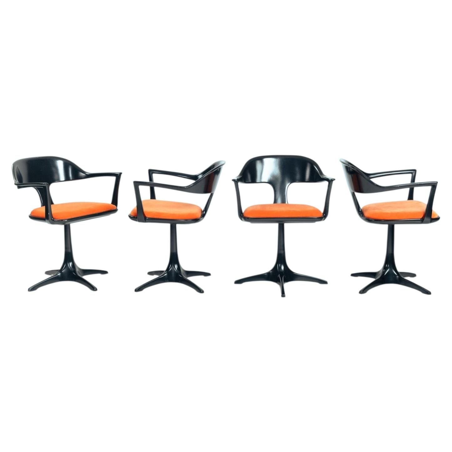 Set of 4 space Age swivel black orange dining room chairs with arms, Emu, 1960s