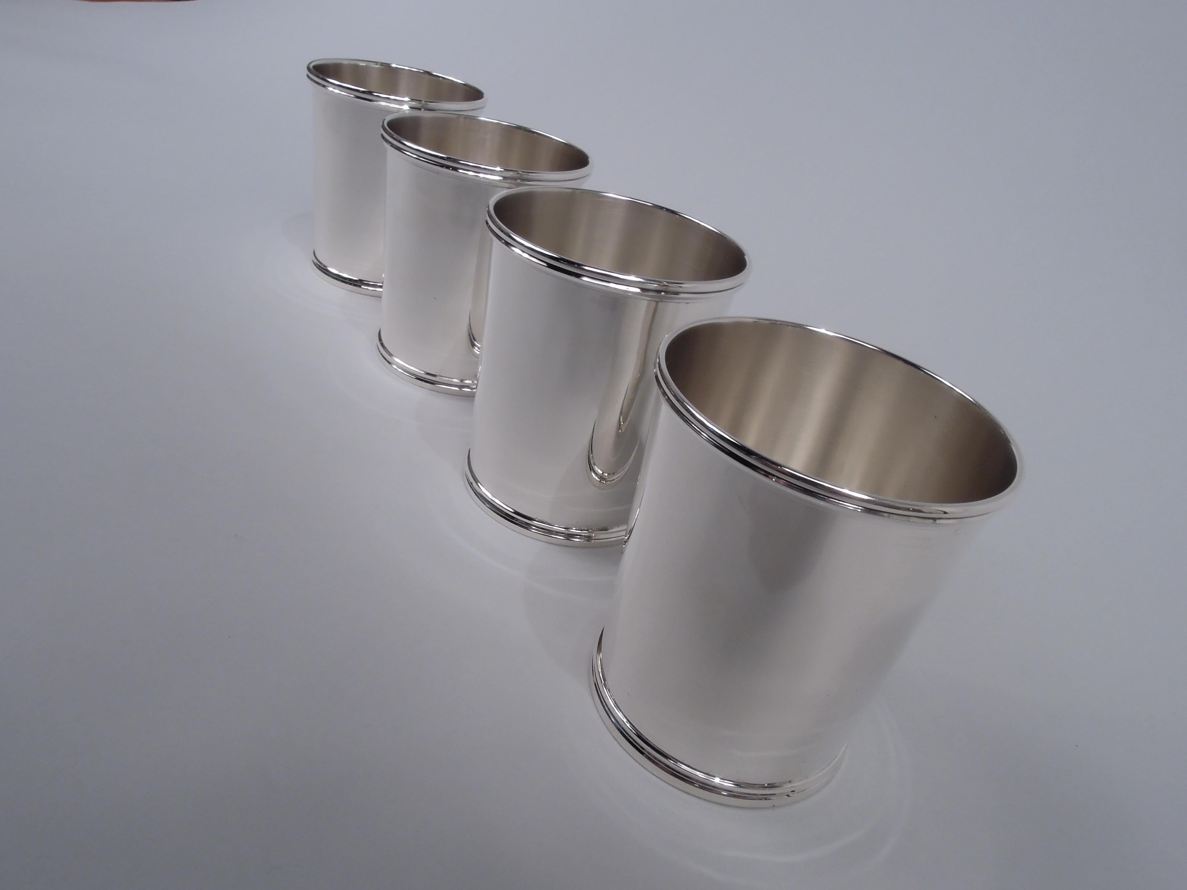 Set of 4 Federal-style sterling silver mint julep cups. Made by Spaulding & Co. (part of Gorham) in Chicago, ca 1920. Each: Straight and gently tapering sides and molded rims. A wonderful way to relax and reflect on the founding years of the