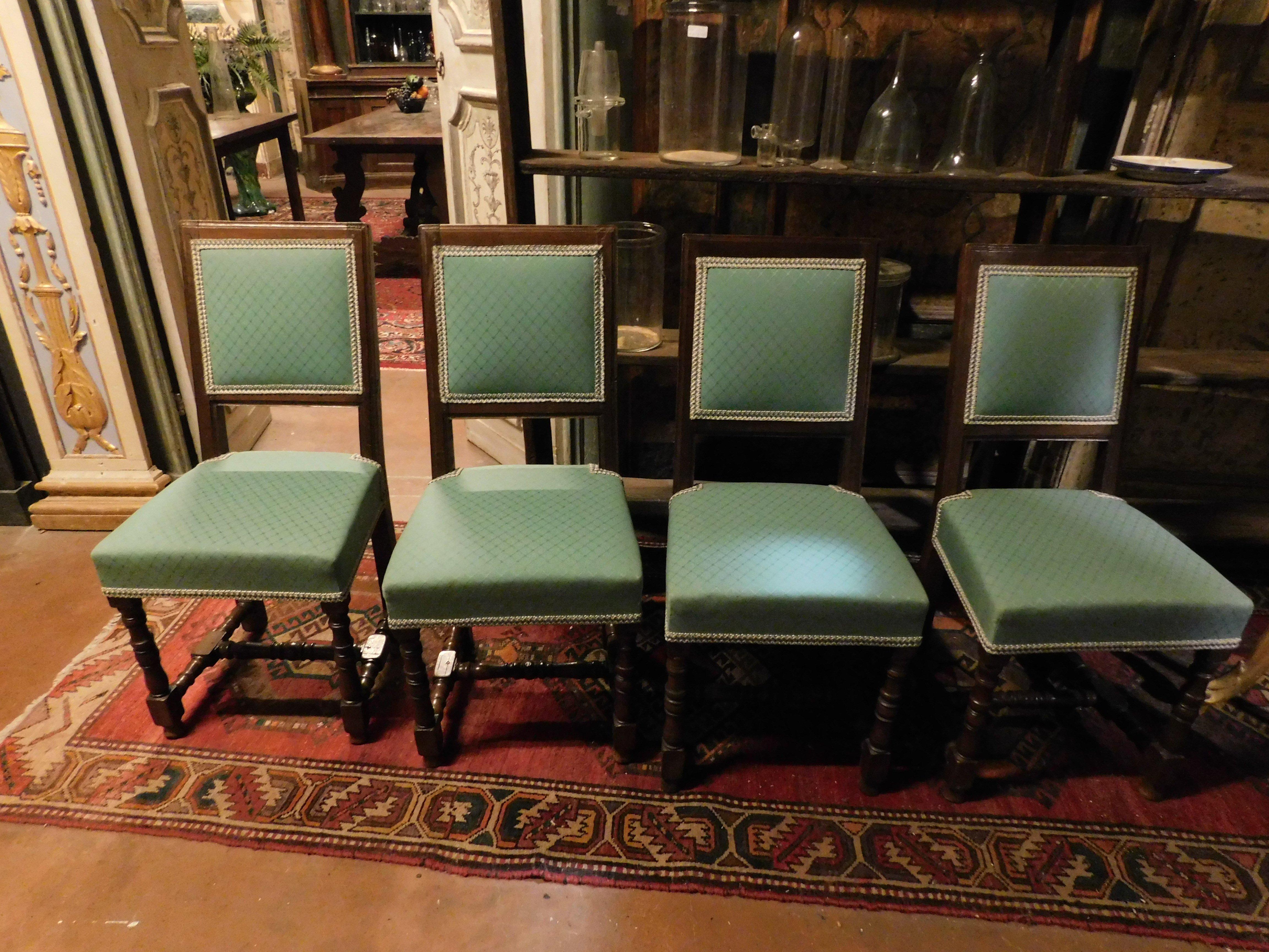 Antique and rare set of 4 walnut chairs, hand-carved with spool type, green/blue upholstery replaced new, original from the 1600s, coming from an Italian residence, excellent as a dining set, perhaps around a modern table in contrast, measures L 45