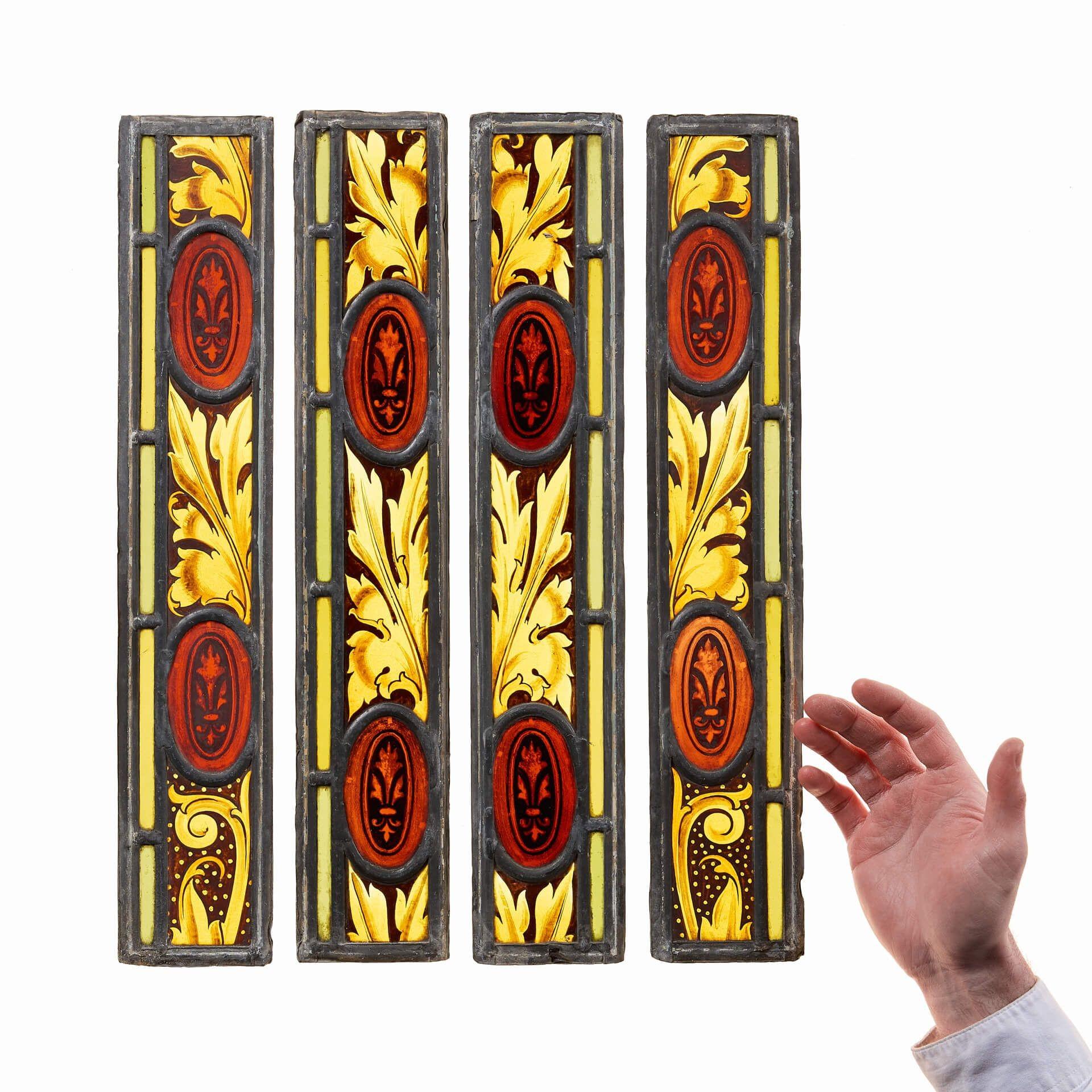 A set of four leaded stained glass panels depicting foliage designs.

In long rectangular shapes these 19th century stained glass window fragments are over 140 years old incorporating both Victorian and arts and crafts styles.

Characterised by