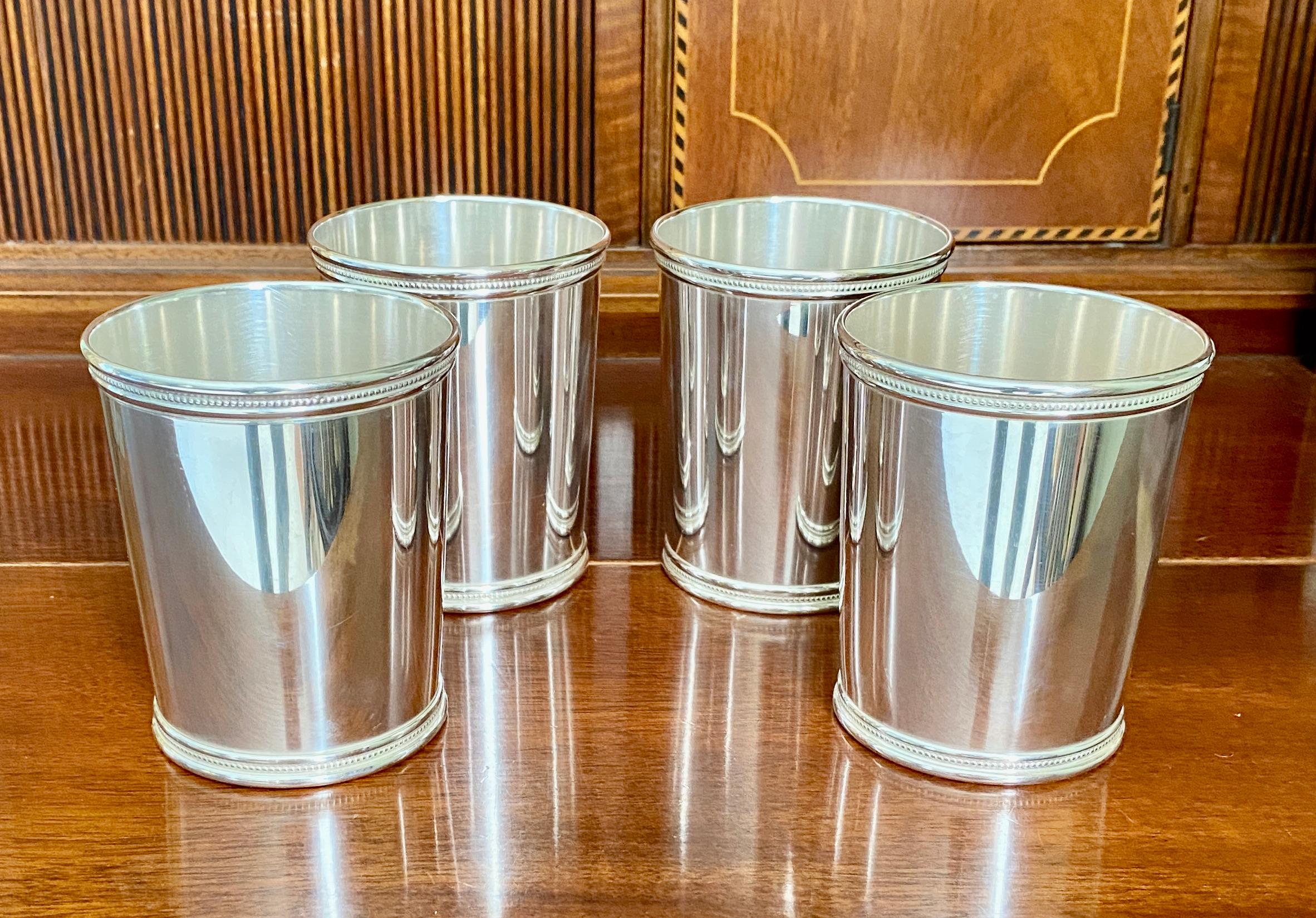The silversmith Benjamin Trees was active in Lexington, Kentucky from 1934 until his death in 1965. His julep cups are highly sought-after by collectors today for their authenticity, purity of design and extremely high quality.

These four matching