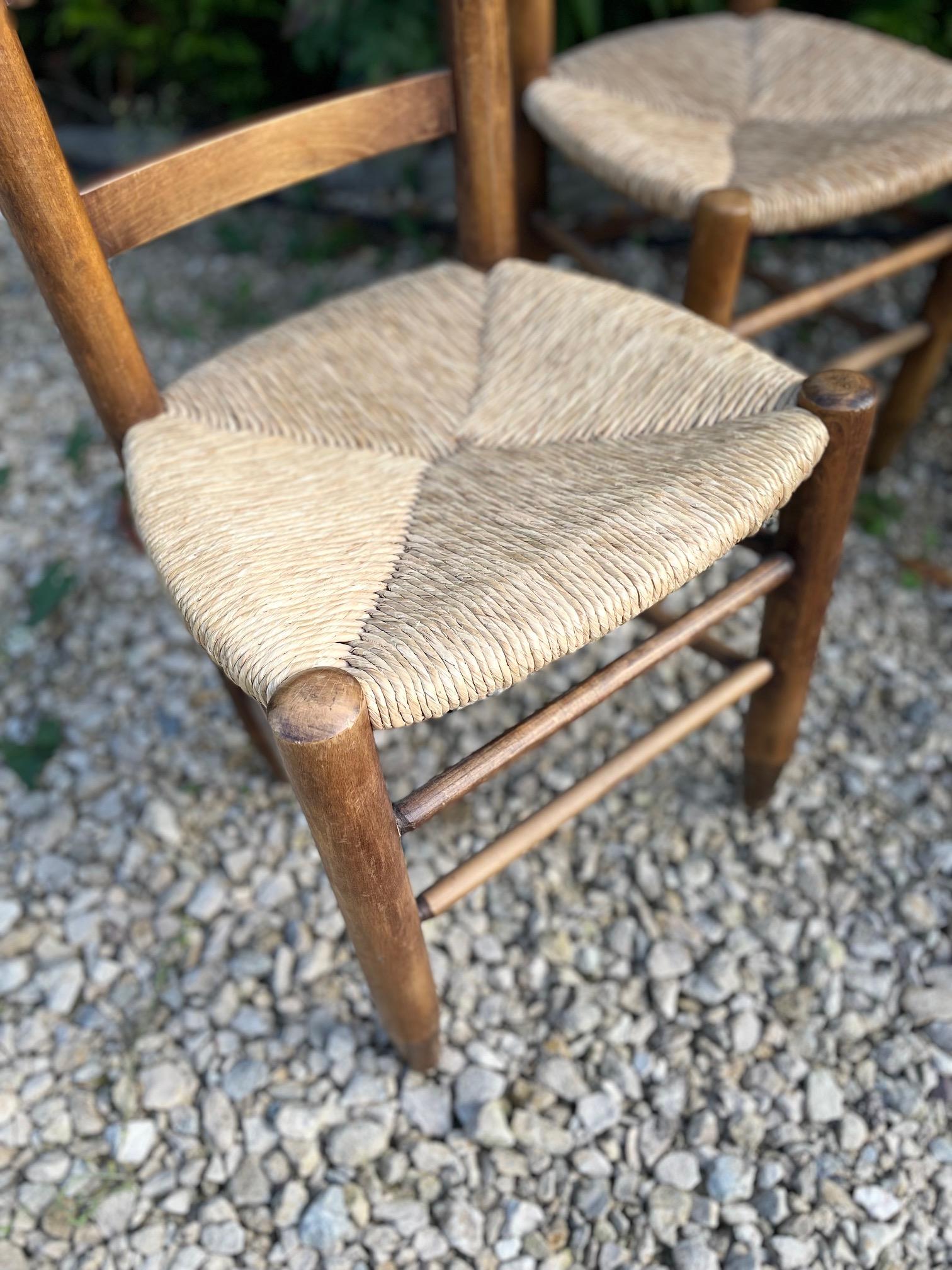 Set of 4 Straw Chairs in the style of  Charlotte Perriand For Sale 1
