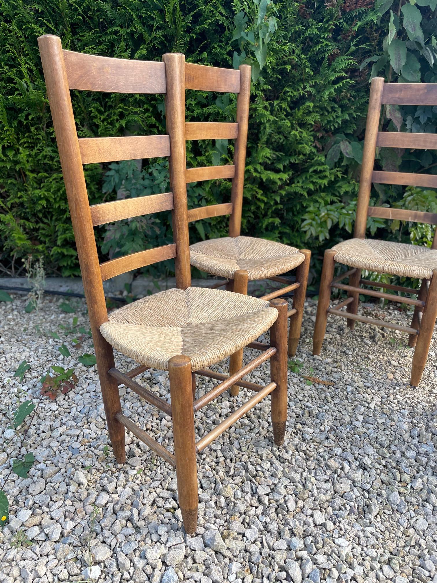 Set of 4 Straw Chairs in the style of  Charlotte Perriand For Sale 3