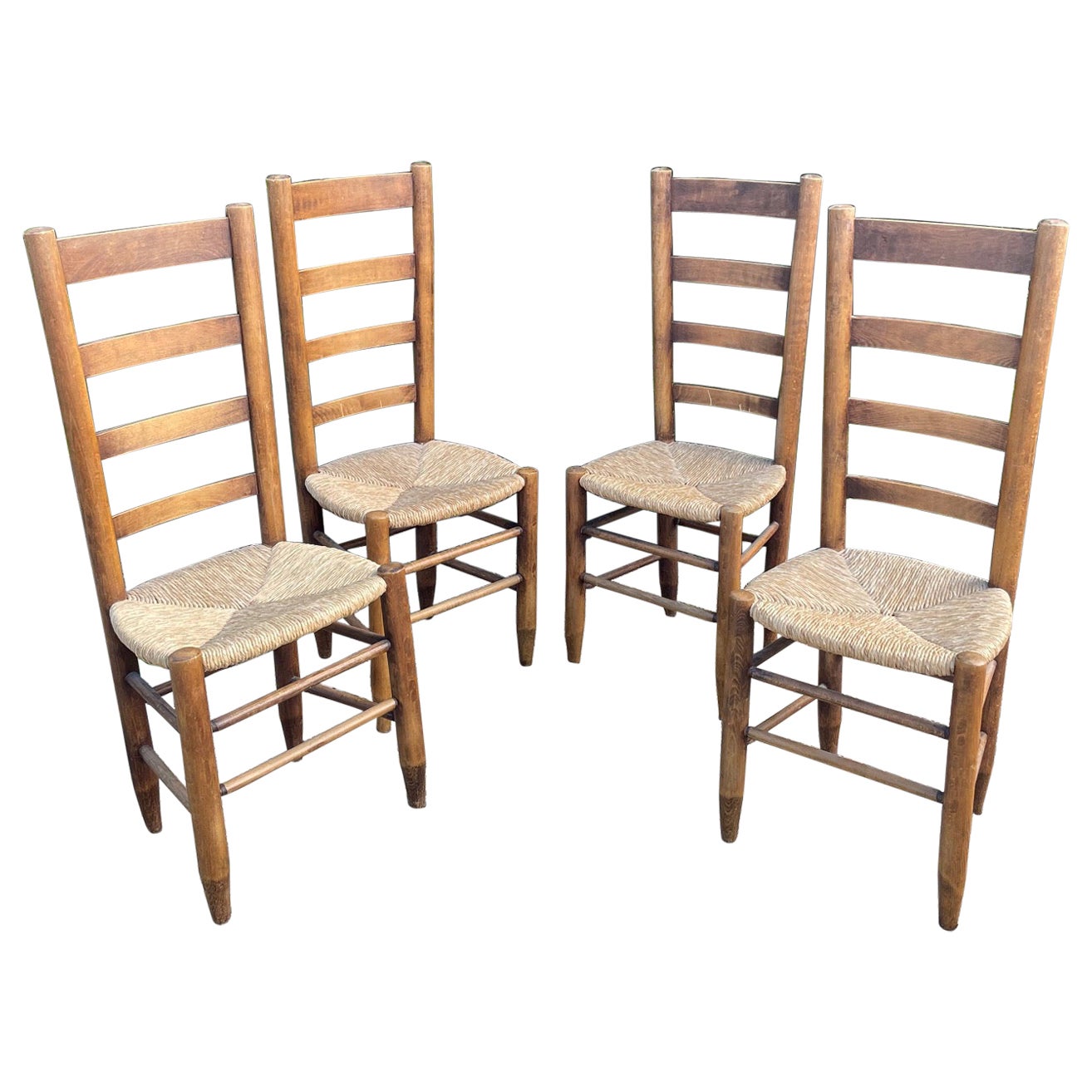 Set of 4 Straw Chairs in the style of  Charlotte Perriand