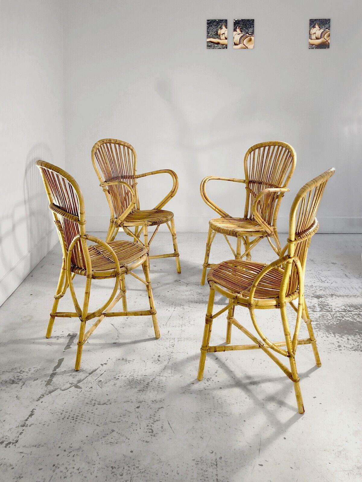 An authentic set of 4 summer chairs including 2 with large armrests, Modernist, Forme-Libre, Shabby-Chic, structures in folded and knotted bamboo, seats and back in woven wicker, by Adrien Audoux and Frida Minnet, each stamped Audoux-Minnet, Golfe