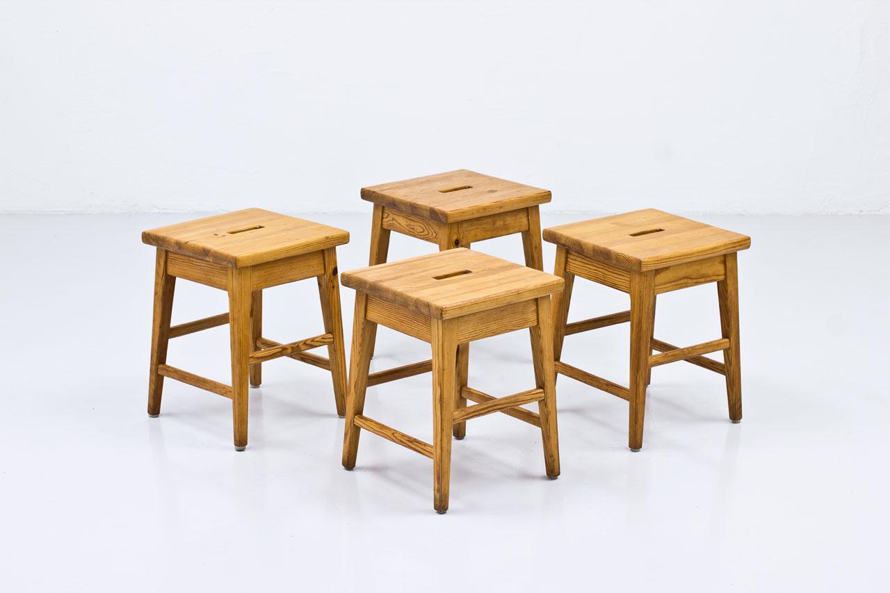 Set of four Swedish pine stools. Manufactured during the 1960s.
  