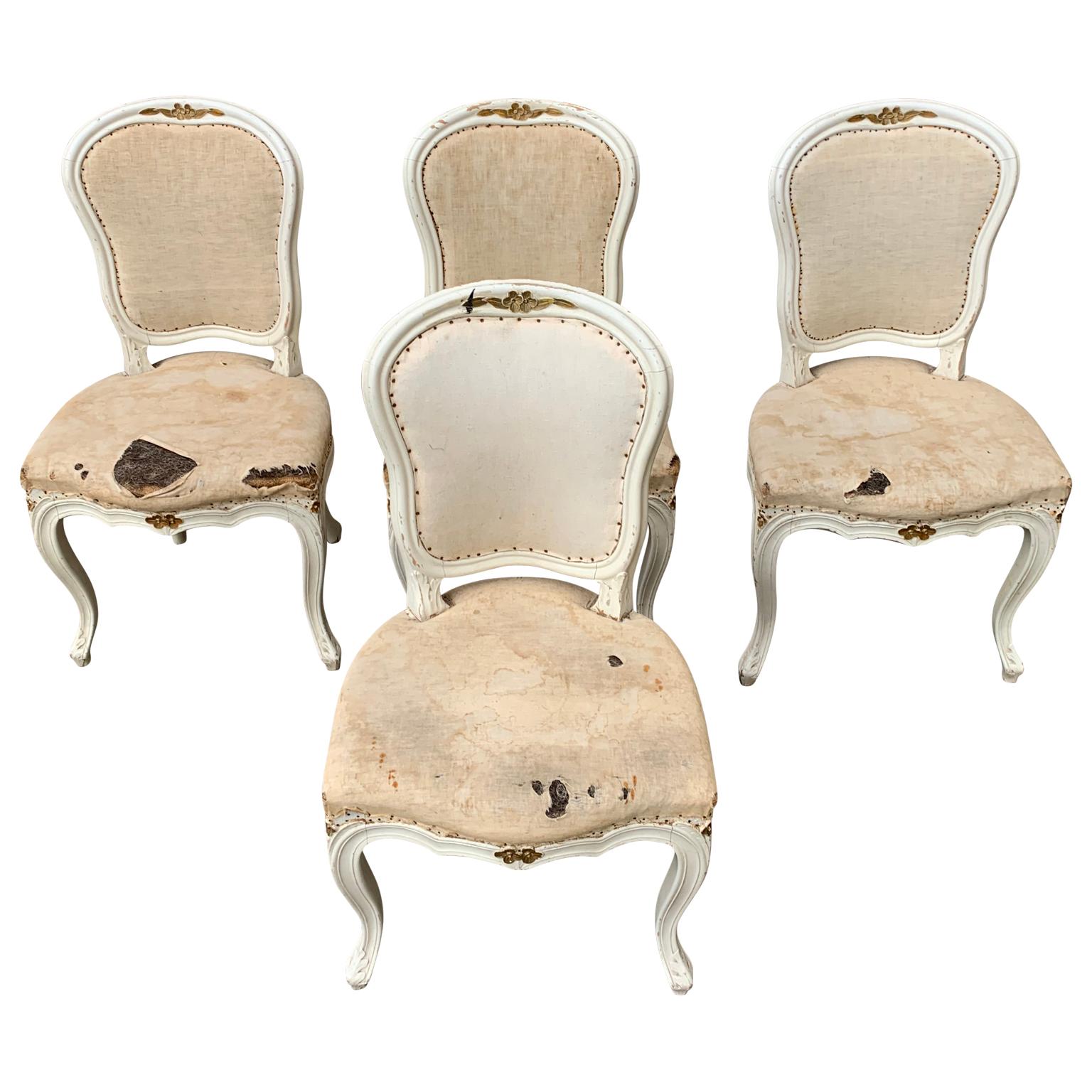 A set of 4 Swedish 19th century rococo style painted dining chairs.

Complimentary delivery to Sweden, Copenhagen, Hamburg, Hannover, Bremen, Amsterdam, Eindhoven, Dortmund, Brussels and bordering areas.