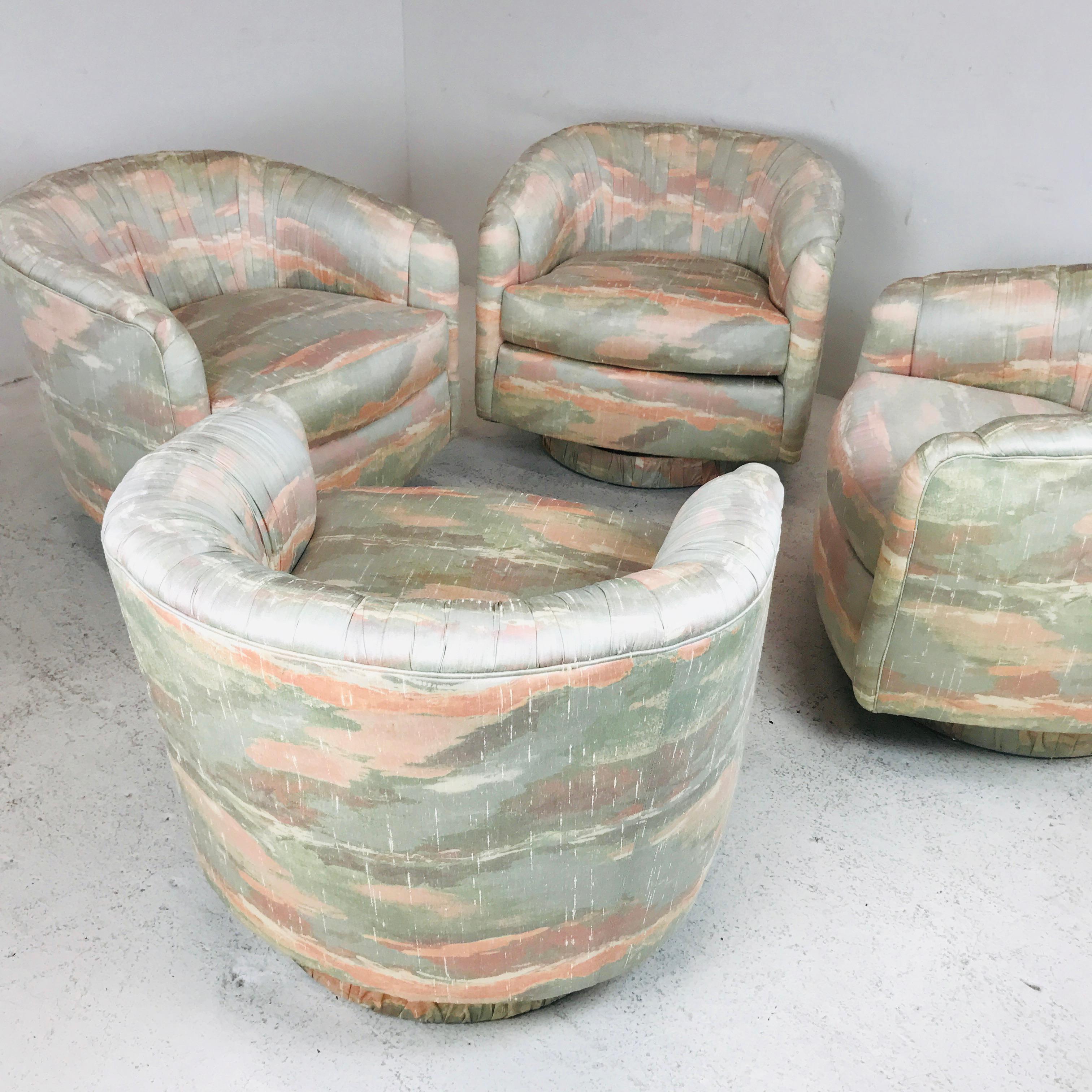 This set of 4 vintage Dansen lounge chairs features 360-degree swivel, plinth base, and comfortable design. Stylish Mid-Century Modern design in the style of Milo Baughman.
