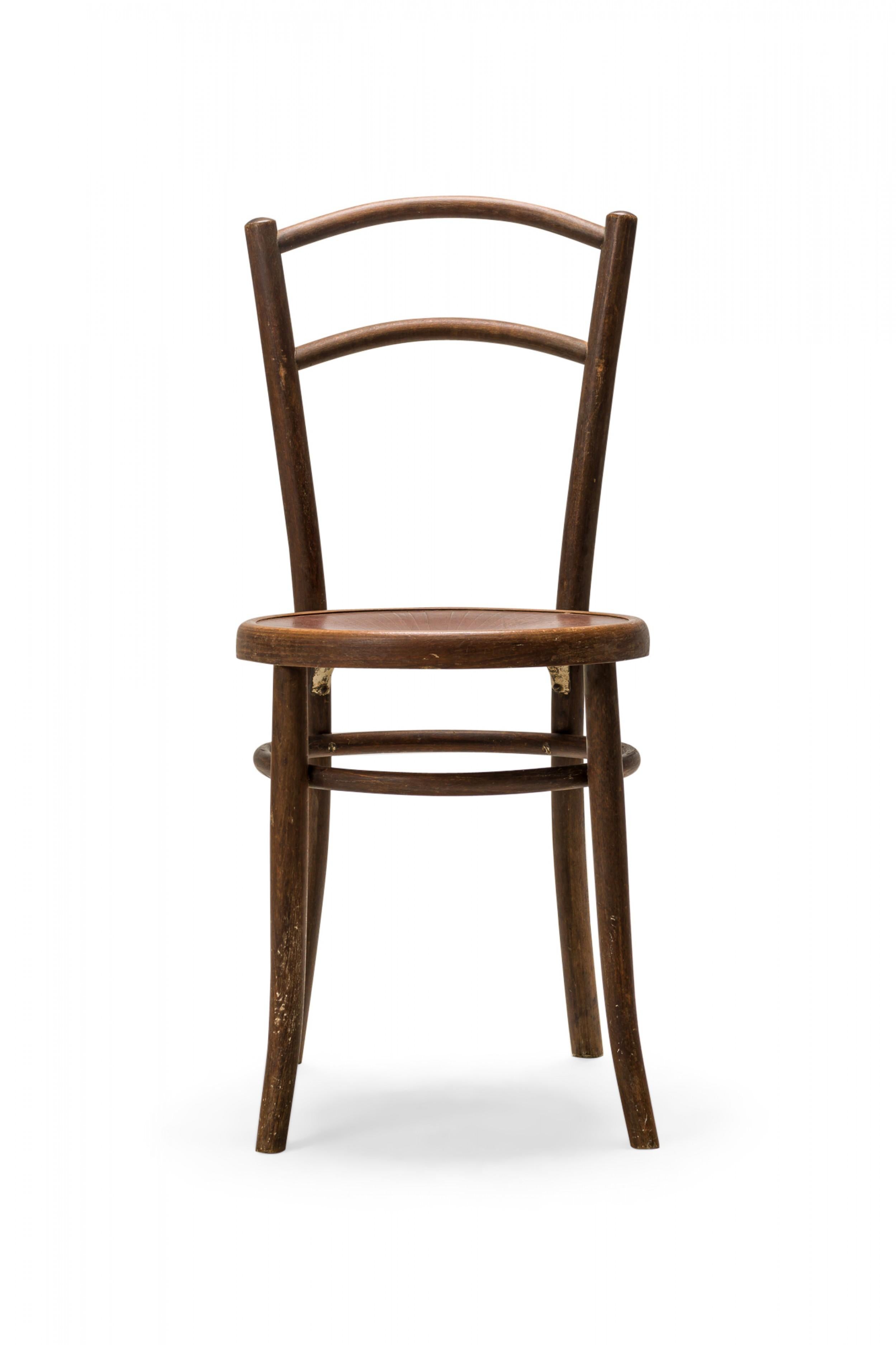 SET of 4 Thonet Bentwood cafe chairs with vertically curved back rests and circular seats. (PRICED AS SET)
