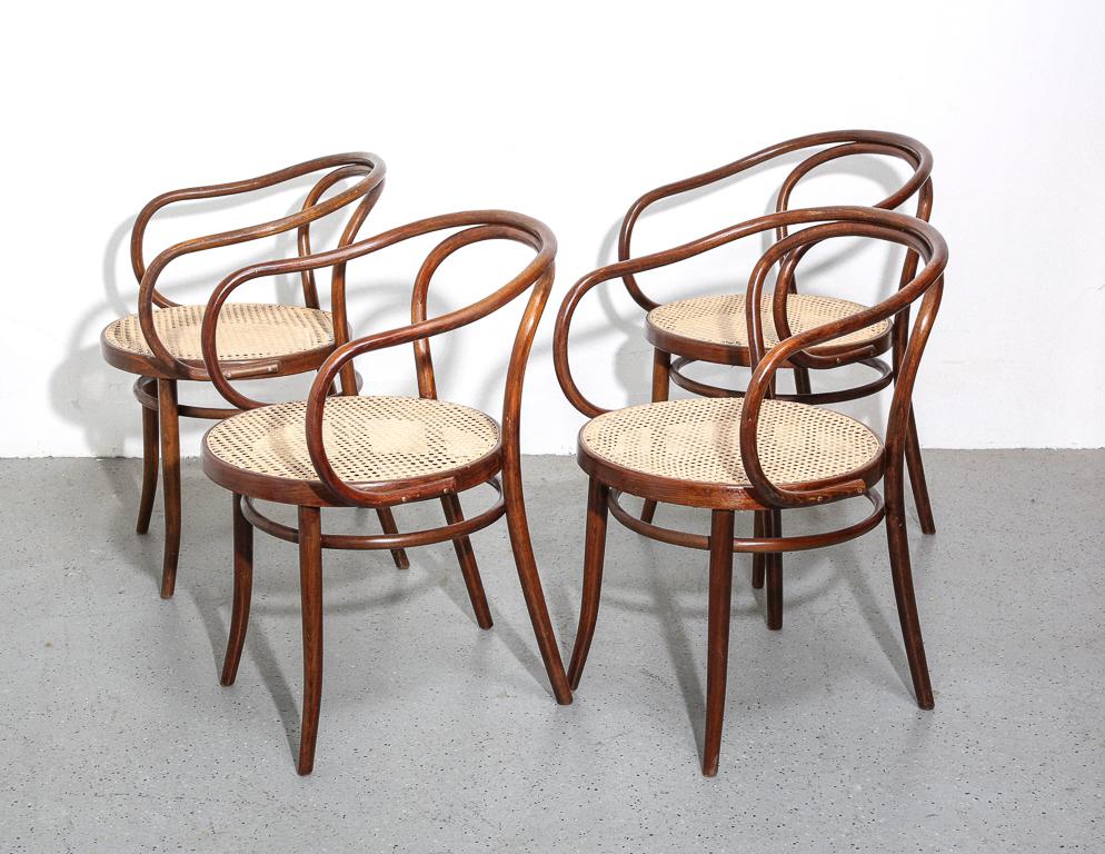 Vintage set of Thonet No. 9 armchairs made under license by Stendig. Bentwood beech frames are newly refinished and all seats newly hand-caned. 18